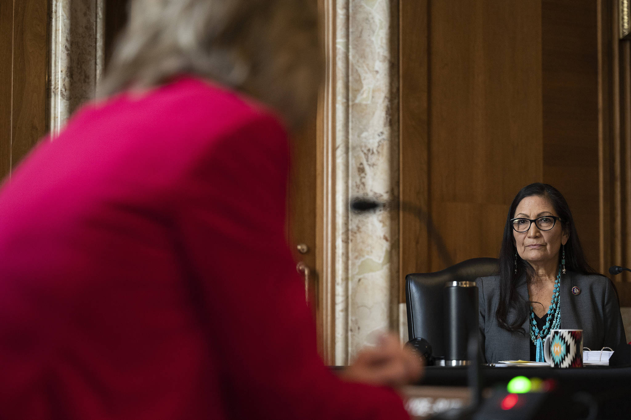 Rep. Deb Haaland, D-N.M., is questioned by Sen. Cindy Hyde-Smith, R-Miss., during the Senate Committee on Energy and Natural Resources hearing on her nomination to be Interior Secretary, Tuesday, Feb. 23, 2021 on Capitol Hill in Washington. (Jim Watson / Pool)