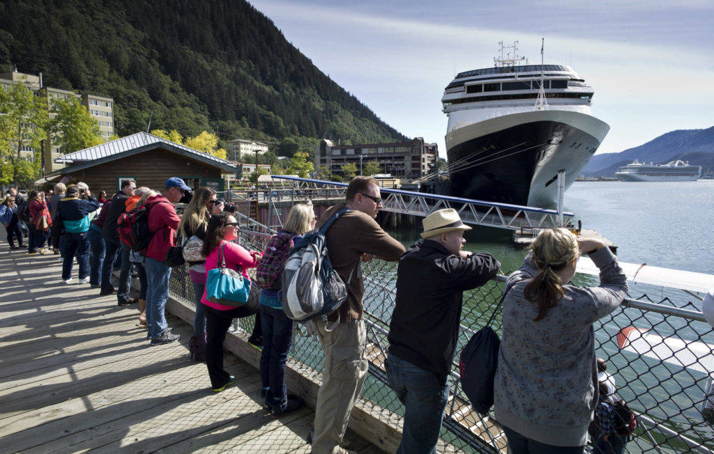 Tourists view Juneau’s downtown harbor in August 2015. (Michael Penn / Juneau Empire File)
