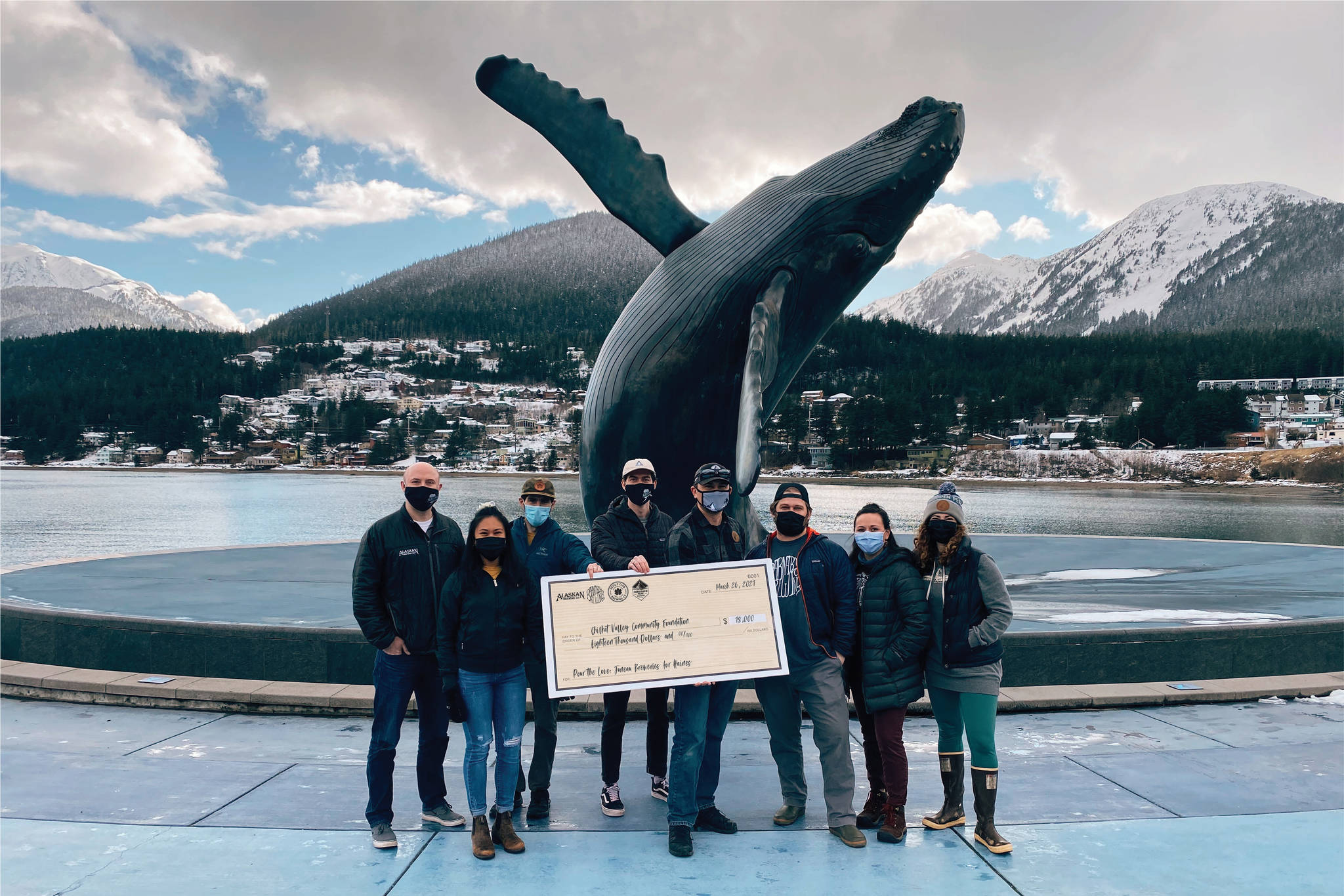 Juneau’s breweries, with a funds-matching donation from the Rasmuson Foundation, donated $36,000 to the Chilkat Valley Community Foundation to assist with relief from last year’s fatal landslides as part of the “Pour the Love” fundraiser on March 30, 2021. (Courtesy photo / Meghan Chambers)