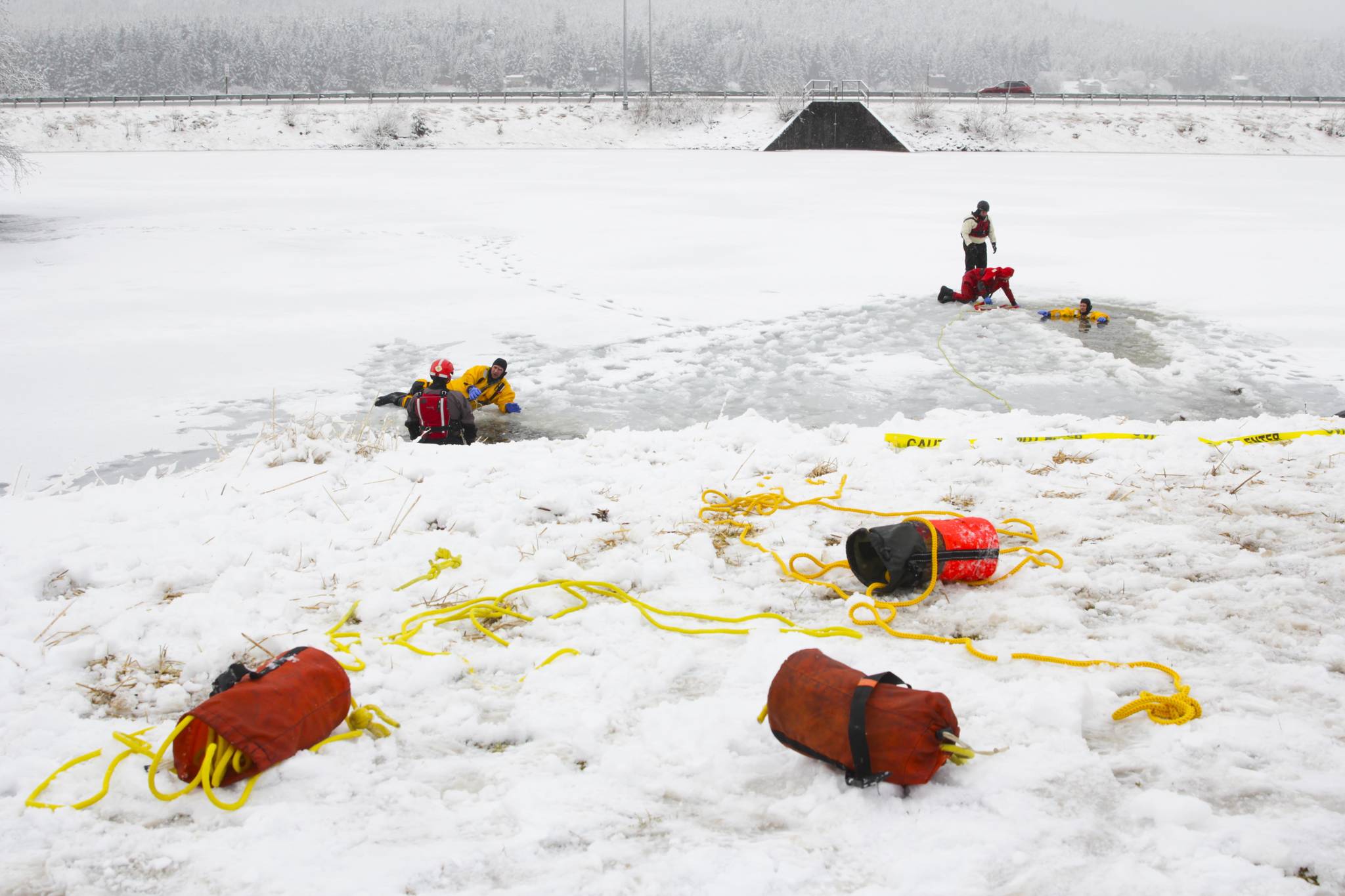 Capital City Fire/Rescue personnel underwent annual ice rescue training at Twin Lakes April 7, 2021. The training occurs in the spring, when the ice is rotted and most dangerous. (Michael S. Lockett / Juneau Empire)