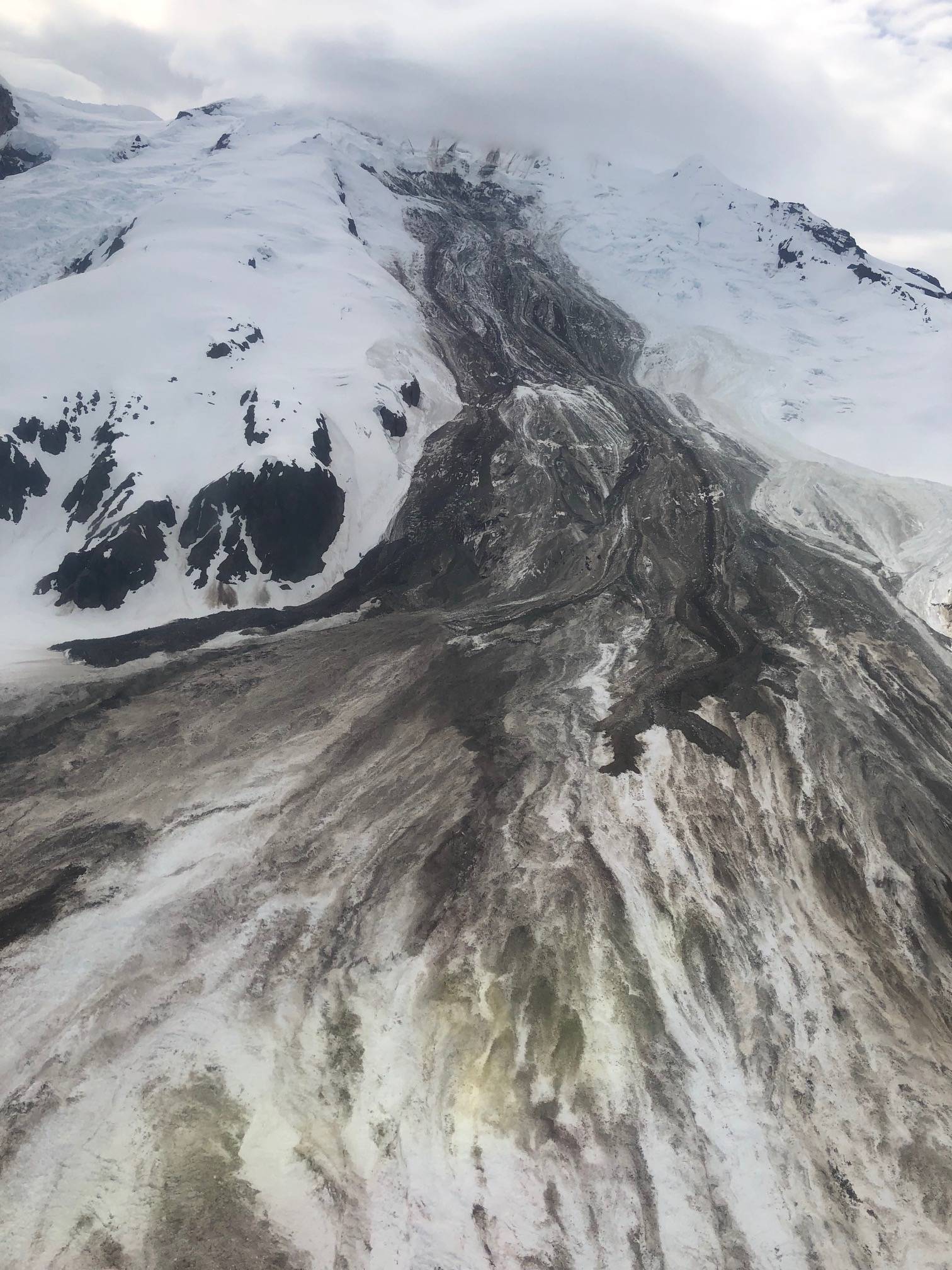 The June 2019 rock-and-ice avalanche down Red Glacier on Iliamna Volcano, taken on a flyover a few days later by Loren Prosser of Ninilchik. (Courtesy Photo / Loren Prosser, Alaska Volcano Observatory)