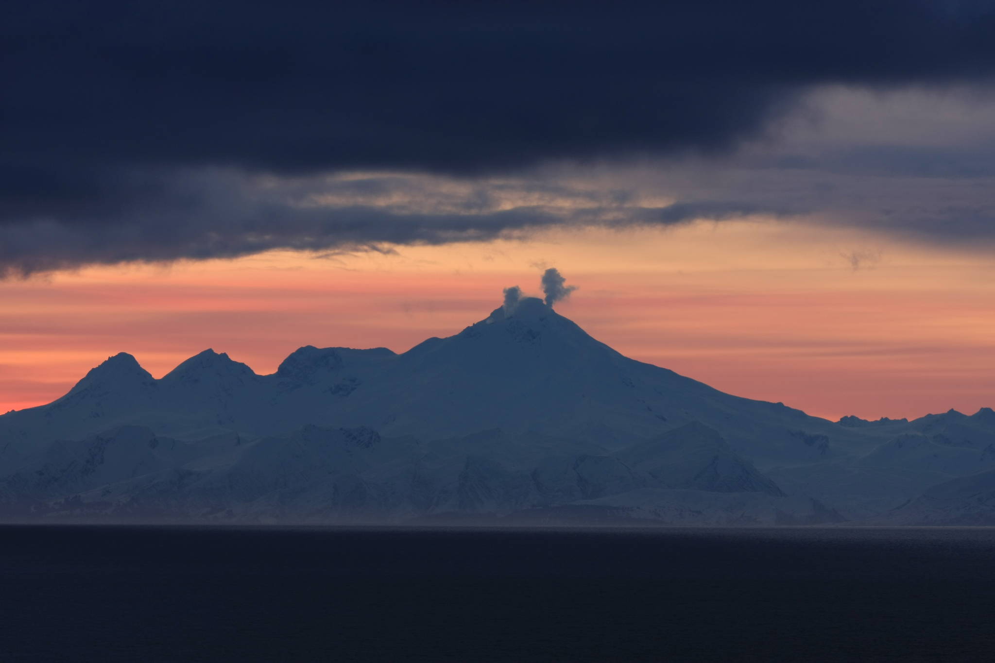 Iliamna Volcano seen from Ninilchik, Alaska, in a photograph by Roy Boone. (Courtesy Photo / Roy Boone, Alaska Volcano Observatory.
