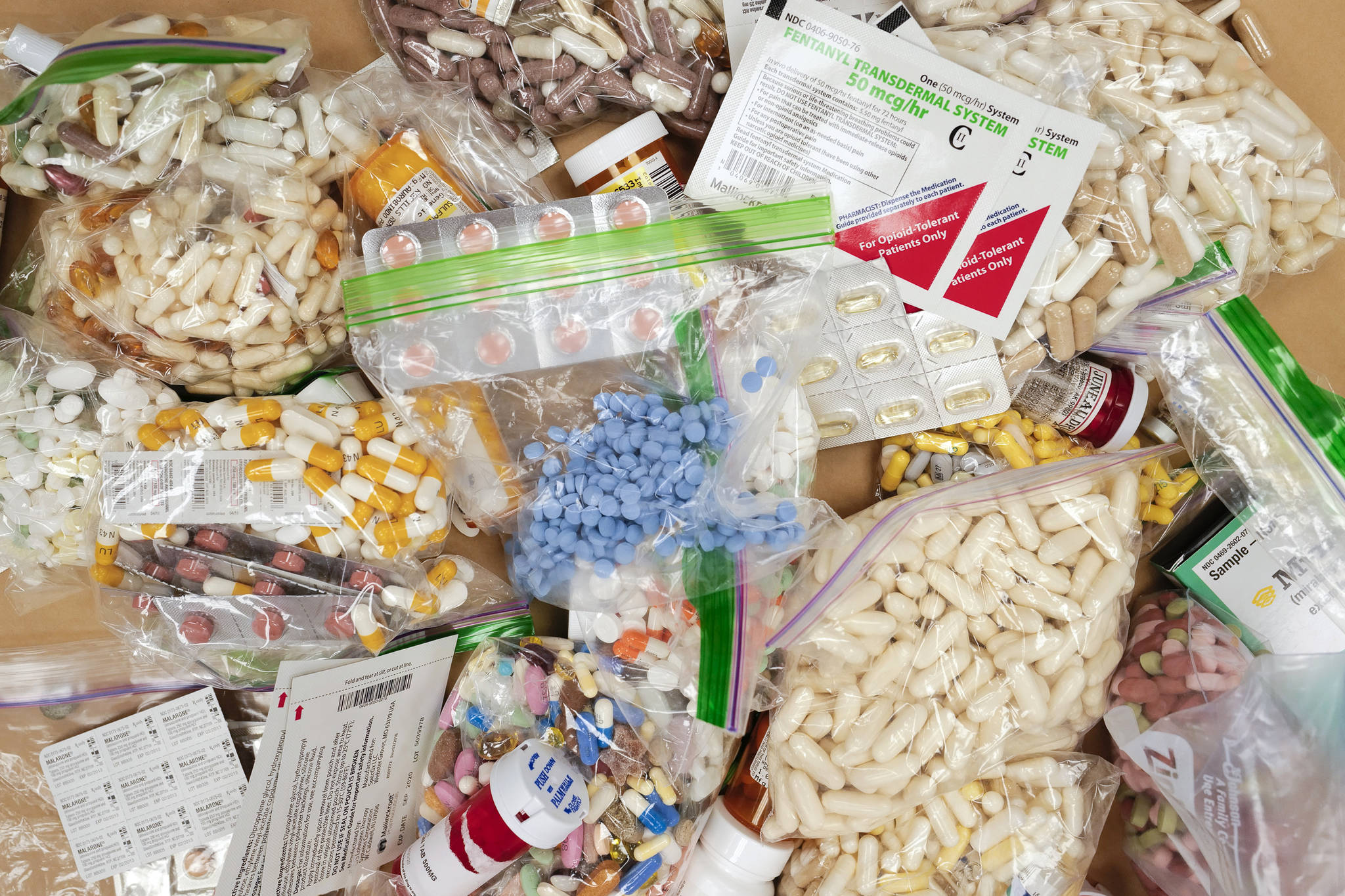 Prescriptions drugs, vitamins, hormones, and other drugs left in the drug drop box in the lobby of the Juneau Police Department in September 2019. (Michael Penn / Juneau Empire File)