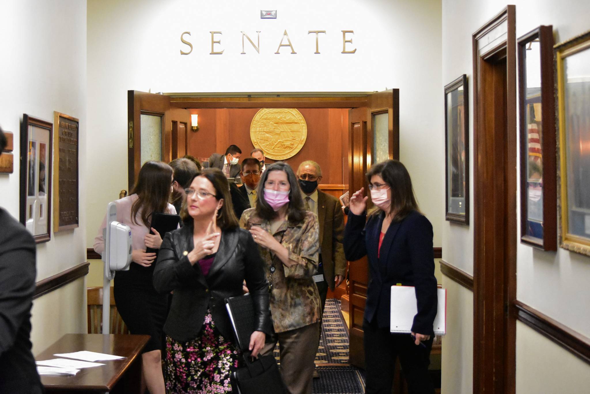 Peter Segall / Juneau Empire
Sen. Lora Reinbold, R-Eagle River, removes her face mask Monday moments after being removed from her committee chairmanship.