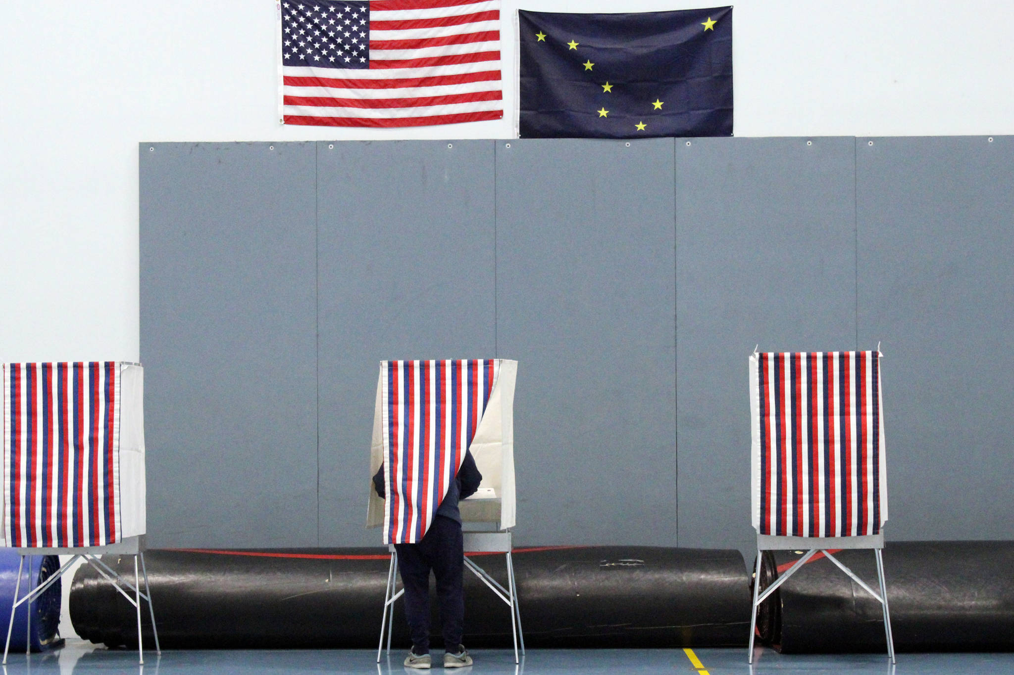 A voter fills out their ballot in the Thunder Mountain High School gymnasium on Tuesday, Nov. 3. (Ben Hohenstatt / Juneau Empire)