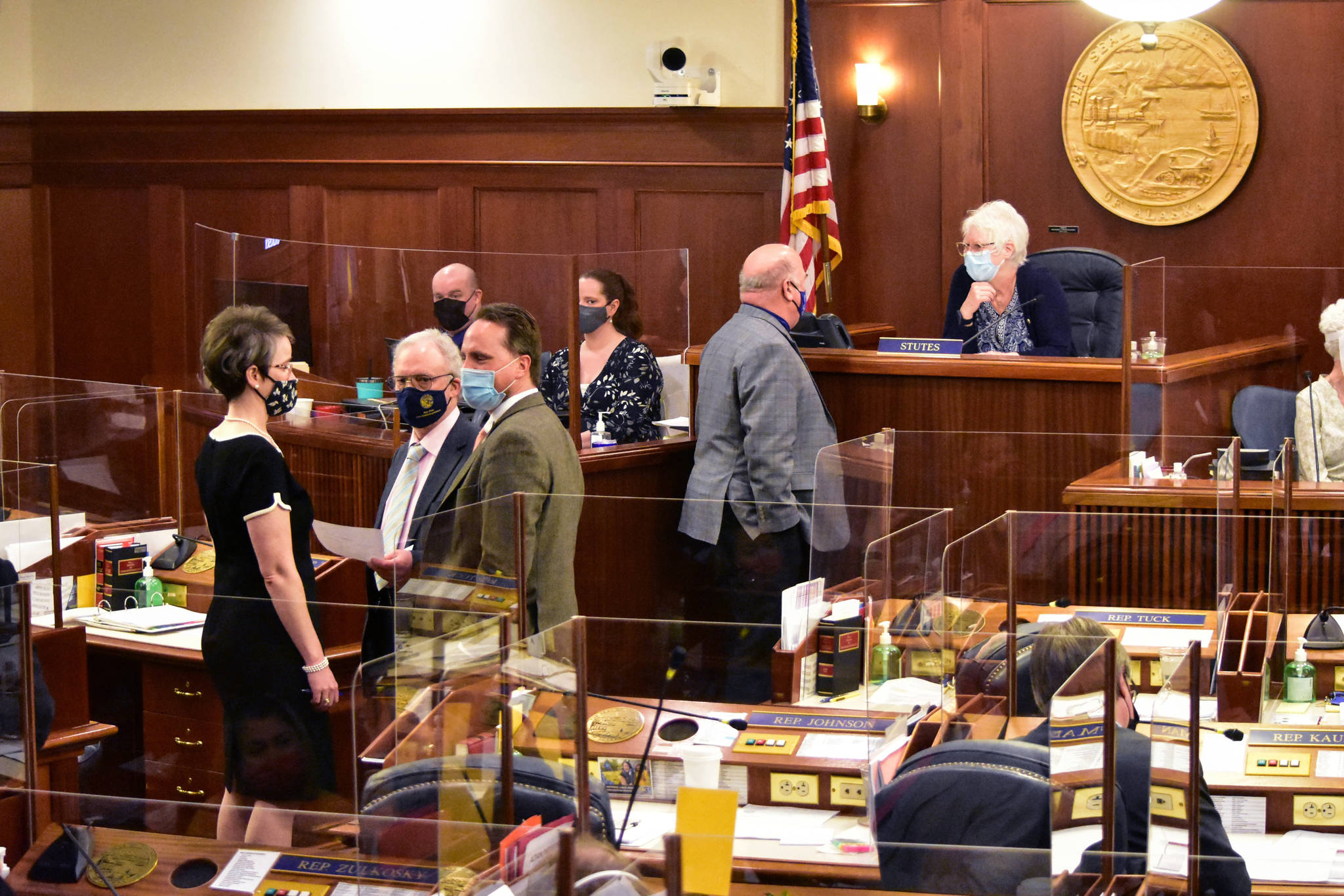 Lawmakers on the floor of the Alaska House of Representatives discuss an amendment on an education funding bill on Wednesday, April 21, 2021. Some House members are trying to pass a budget specifically for education, a departure from past years. (Peter Segall / Juneau Empire)