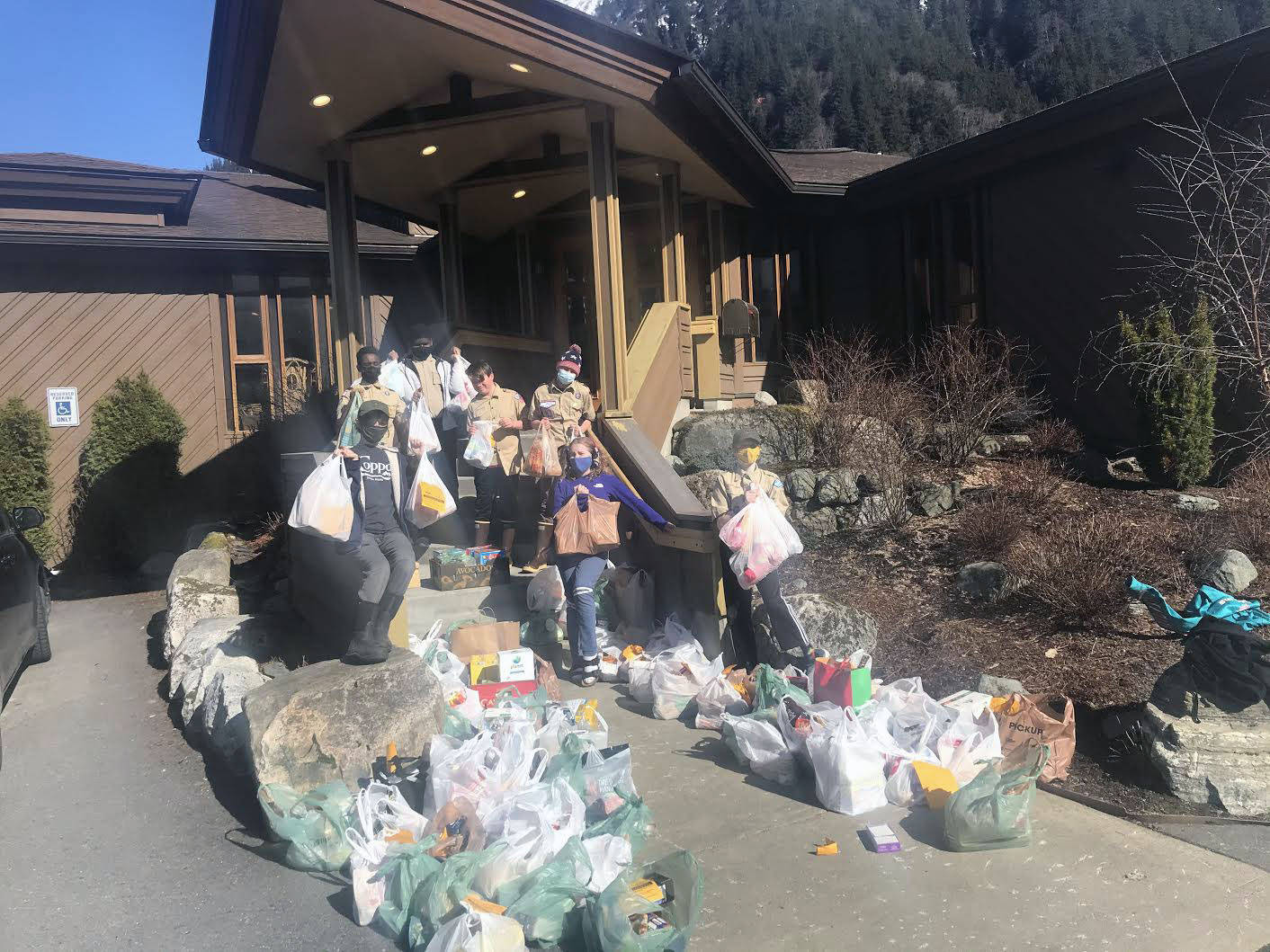 Scouts from BSA Troop 11 gathered and donated 562 pounds of food to the food bank at Resurrection Lutheran Church on April 17. The troop meets at the downtown church and collected food from the surrounding neighborhoods. (Courtesy photo/Troop 11)