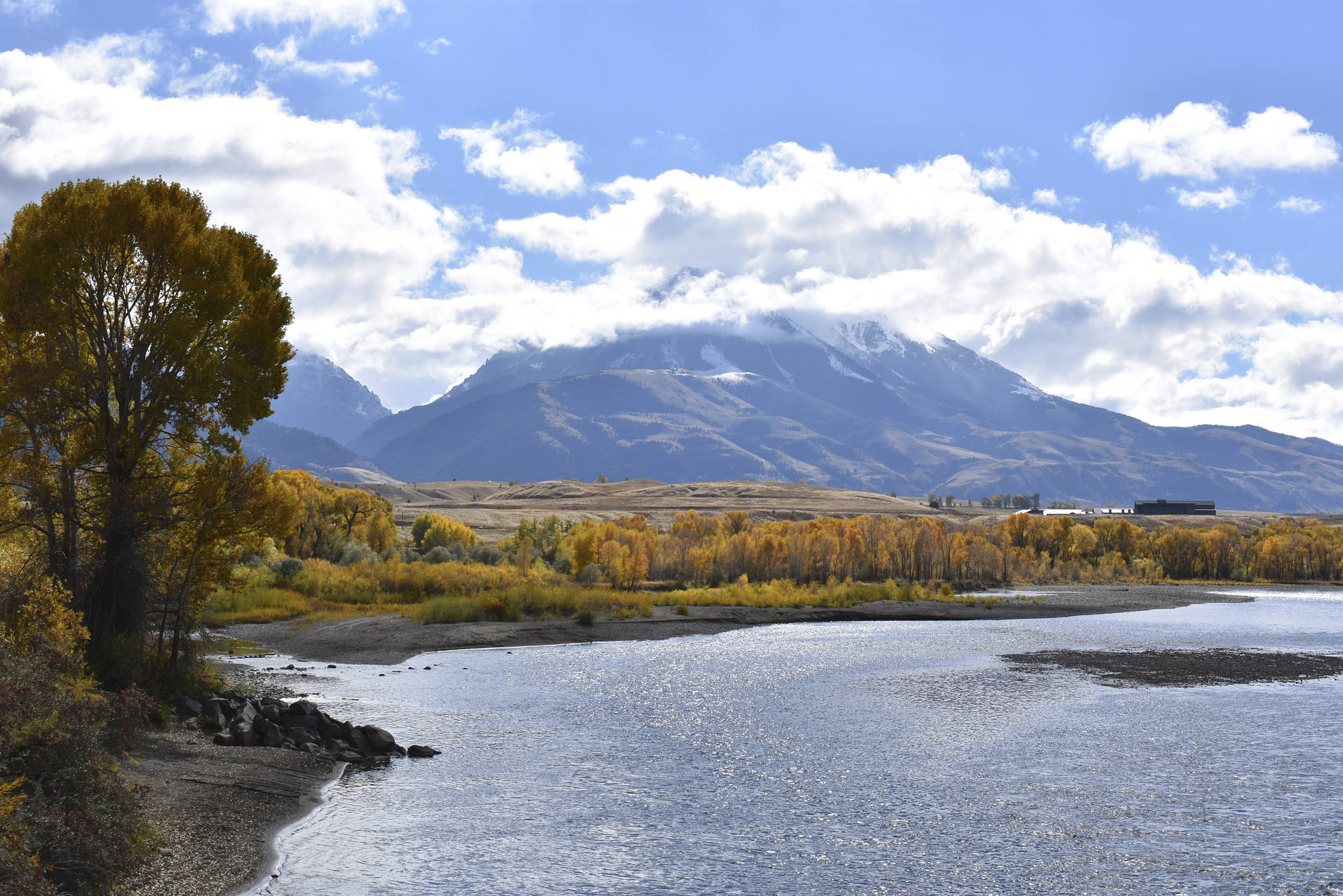 This photo shows Emigrant Peak rising above the Paradise Valley and the Yellowstone River near Emigrant, Mont. The Biden administration has nominated a longtime environmental advocate and Democratic aide, Tracy Stone-Manning, to oversee roughly 250 million acres of public lands as director of the Bureau of Land Management. (AP Photo / Matthew Brown)