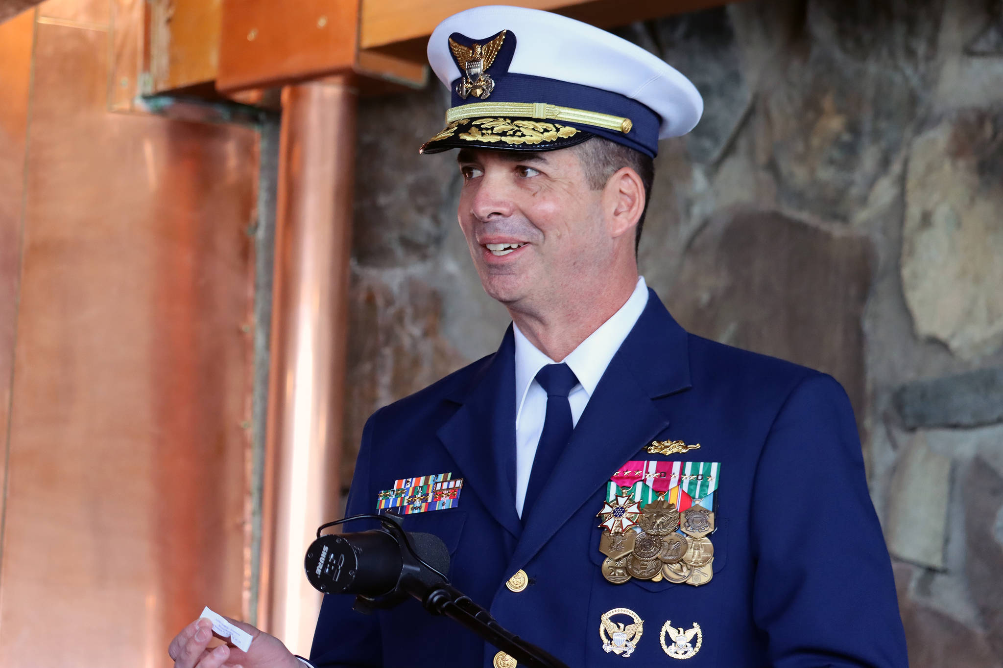 Ben Hohenstatt / Juneau Empire
Rear Adm. Nathan A. Moore, new commander for Coast Guard District 17, holds a fortune from a fortune cookie that reads “Blessed is that man who has found his work.” Moore said he received the fortune on his first day in Juneau and he found it fitting as he was poised to take his new post.
