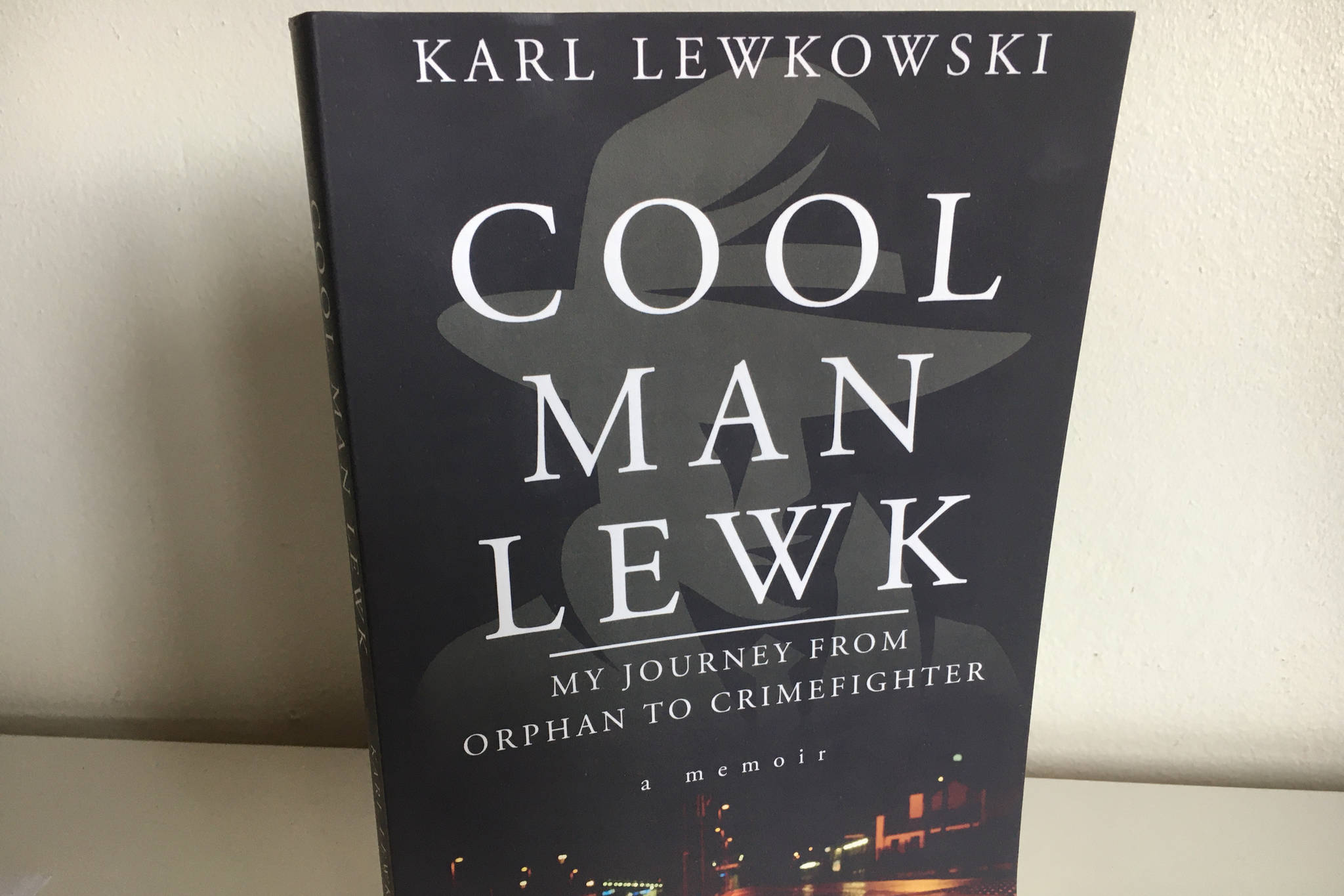 Karl Lewkowski’s book “Cool Man Lewk: My Journey from Orphan to Crimefighter” talks about Lewkowski’s seven years as an officer in the Juneau Police Department, among other aspects of his life. (Michael S. Lockett / Juneau Empire)