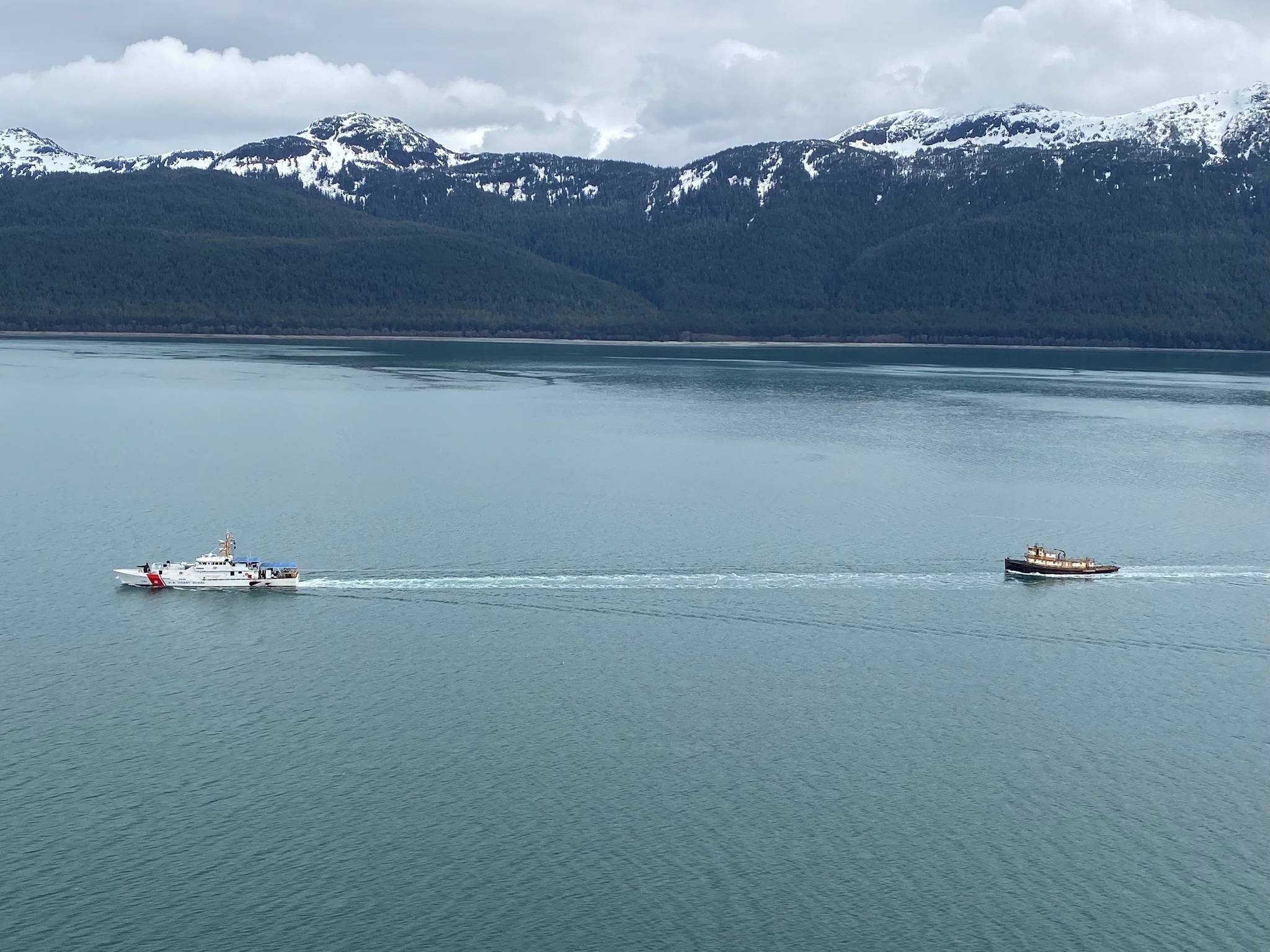 Coast Guard Cutter John McCormick, a 154-foot Sentinel–class vessel, towed the derelict tugboat Lumberman, to a position 54 miles west of Cross Sound, Alaska, on May 2, 2021. The 107-ft steel hulled tugboat was scuttled in over 8,400 feet of water. (Courtesy photo / U.S. Coast Guard)