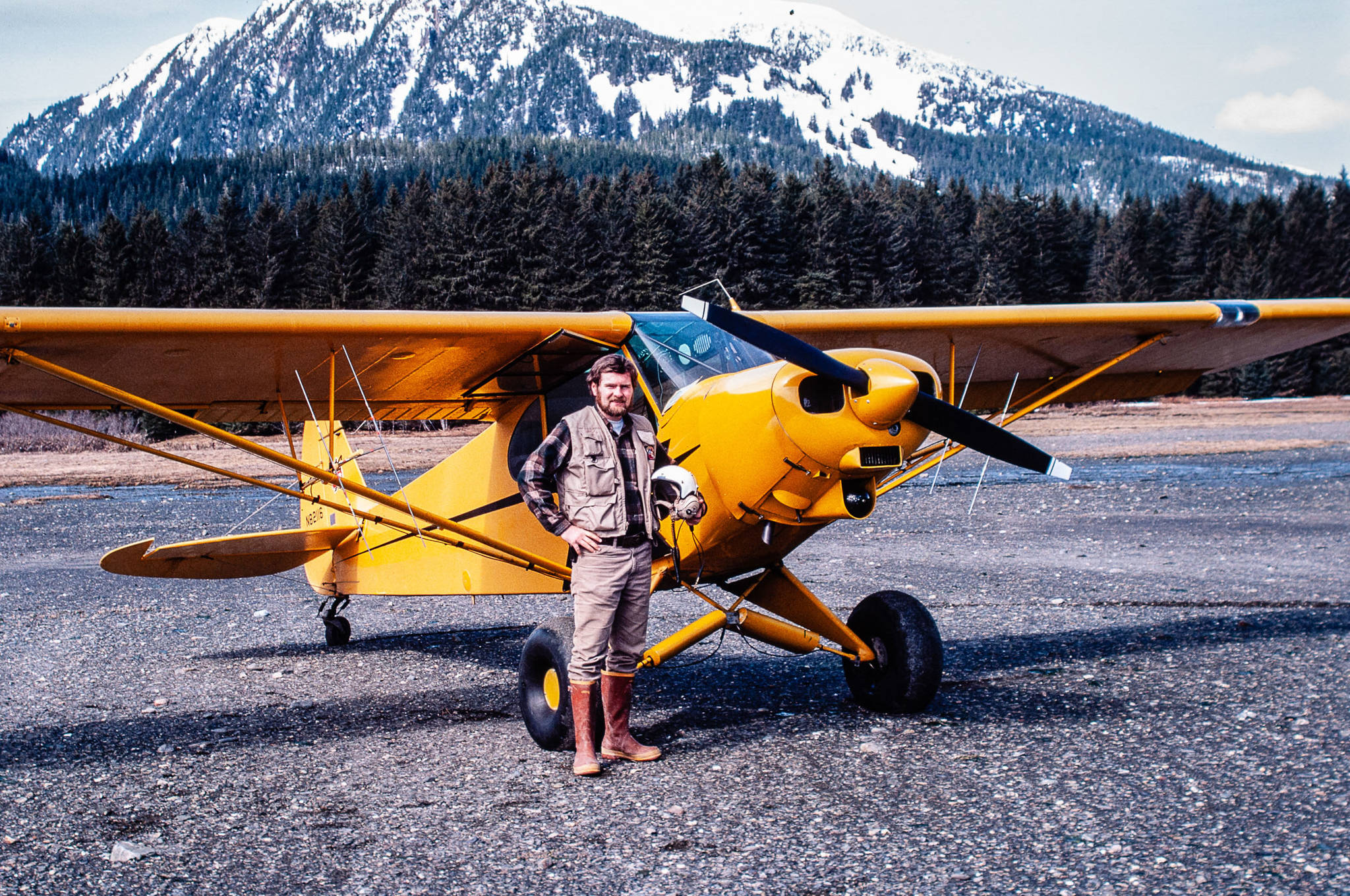 Courtesy Photo / John Schoen 
Biologist John Schoen with the Super Cub on a beach on Admiralty Island. The two antennas under each wing were used to determine which direction had the strongest signal from radio-collared animals. They then could locate the animals within an area about the size of an acre.