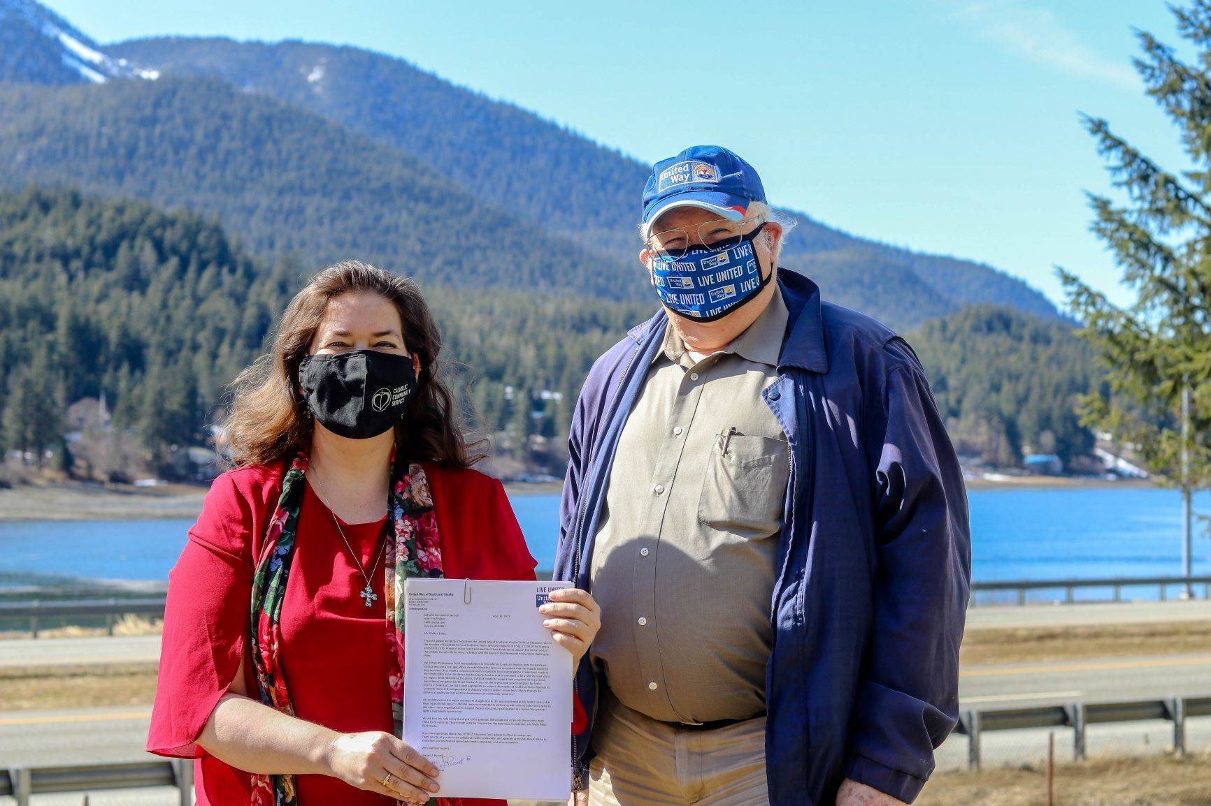 Courtesy Photo
Erin Walker-Tolles, executive director of Catholic Community Service, stands with Wayne Stevens, president and CEO of United Way of Southeast Alaska. CCS was among the organizations to receive grant funding from UWSEAKs COVID-19 Response Fund.