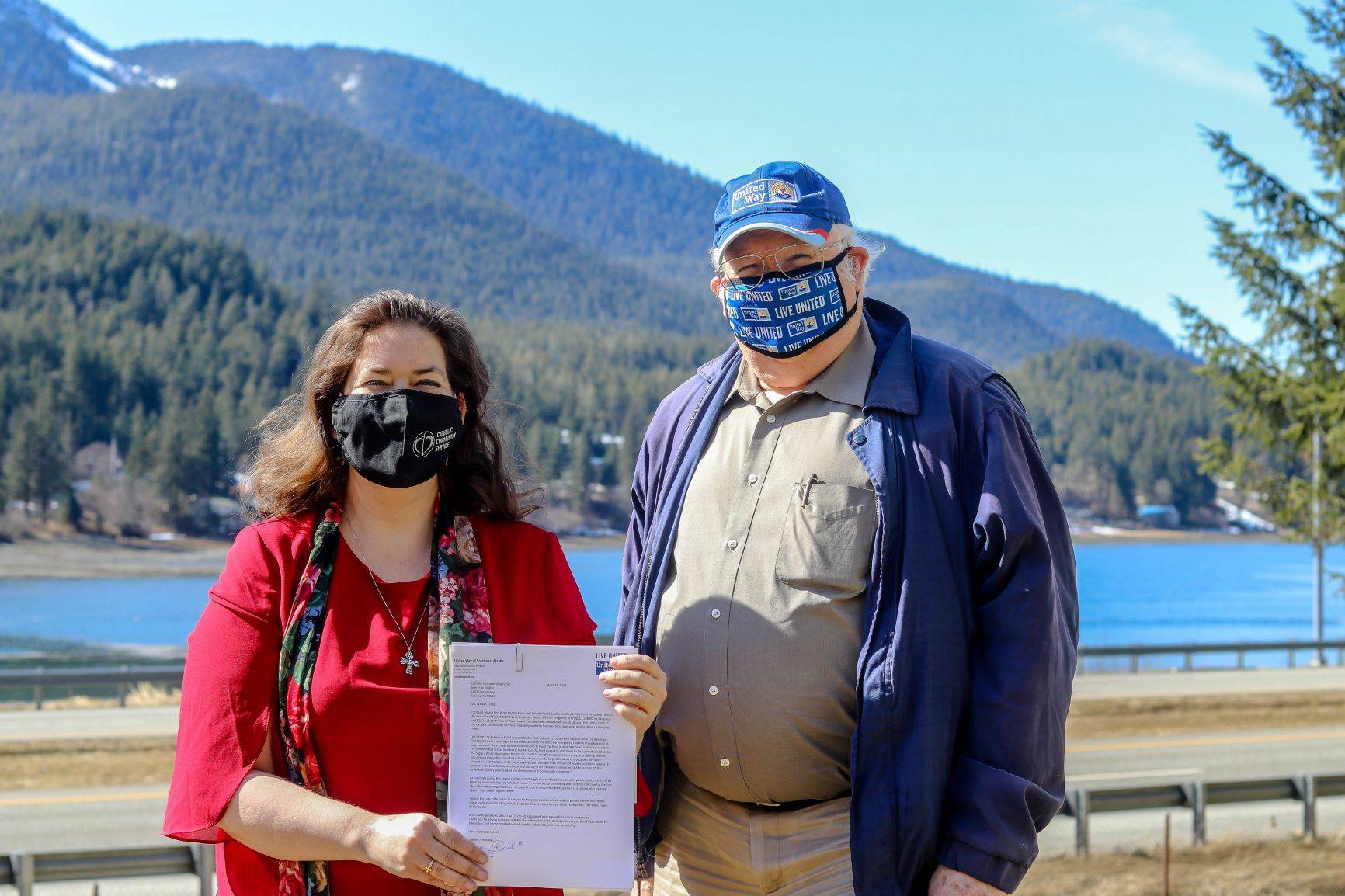Courtesy Photo
Erin Walker-Tolles, executive director of Catholic Community Service, stands with Wayne Stevens, president and CEO of United Way of Southeast Alaska. CCS was among the organizations to receive grant funding from UWSEAK’s COVID-19 Response Fund.