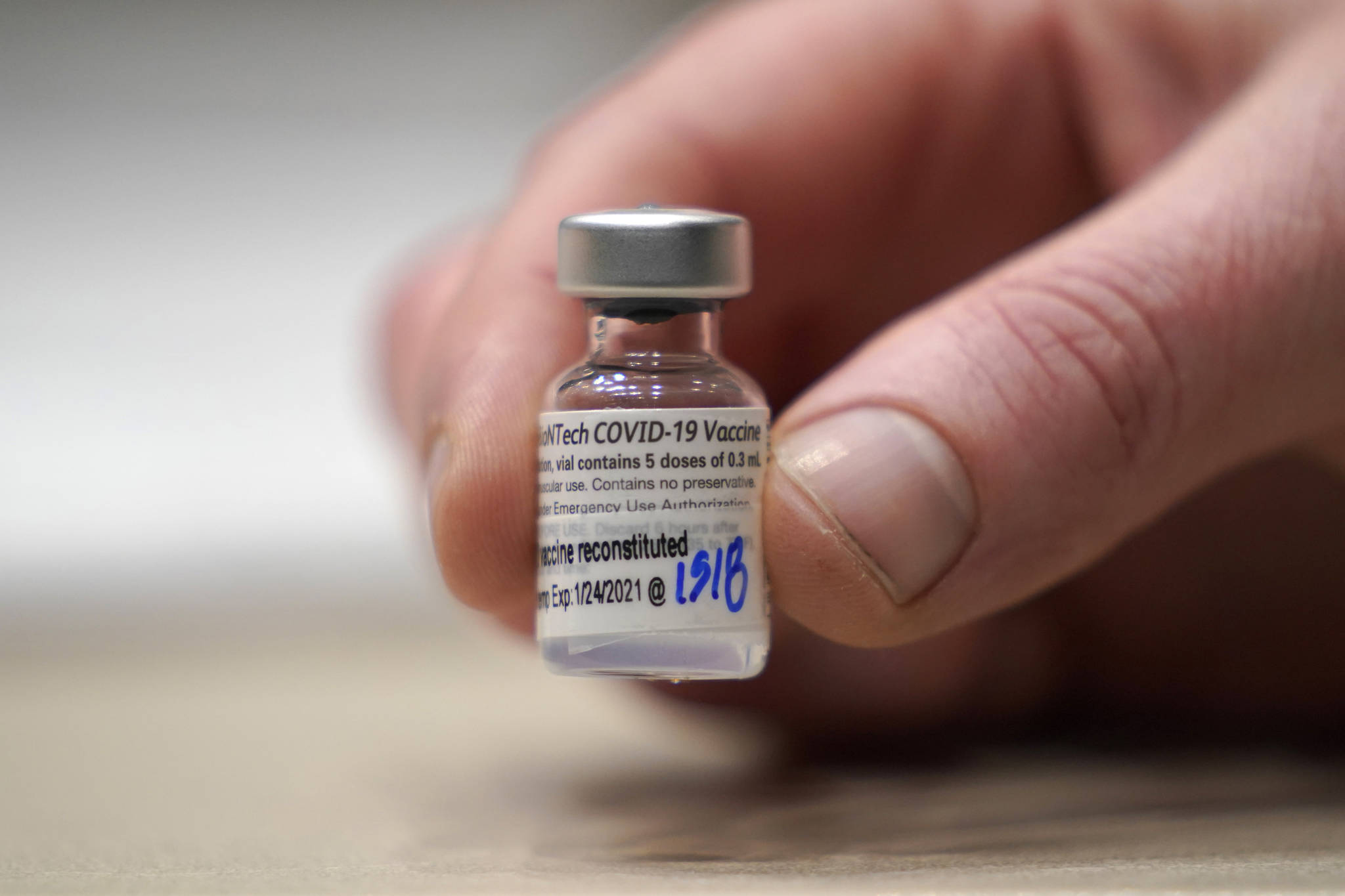 This photo shows a vial of the Pfizer vaccine for COVID-19 in Seattle. U.S. regulators on Monday, May 10, 2021, expanded use of Pfizer’s shot to those as young as 12, sparking a race to protect middle and high school students before they head back to class in the fall. (AP Photo / Ted S. Warren)