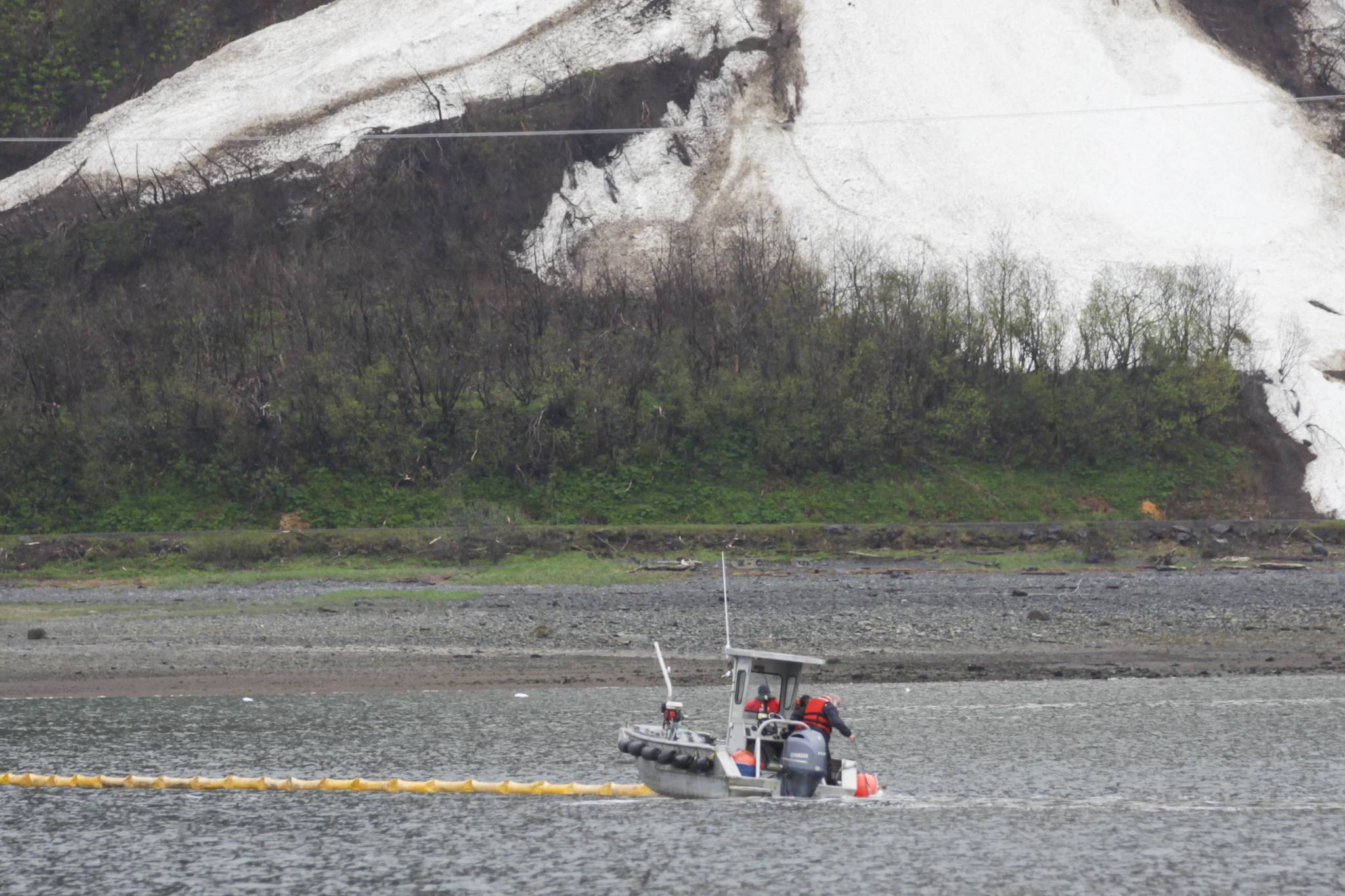 Coast Guardsmen and partner organizations practice oil spill cleanup in the Gastineau Channel near Sandy Beach on May 11. 2021. (Michael S. Lockett / Juneau Empire)