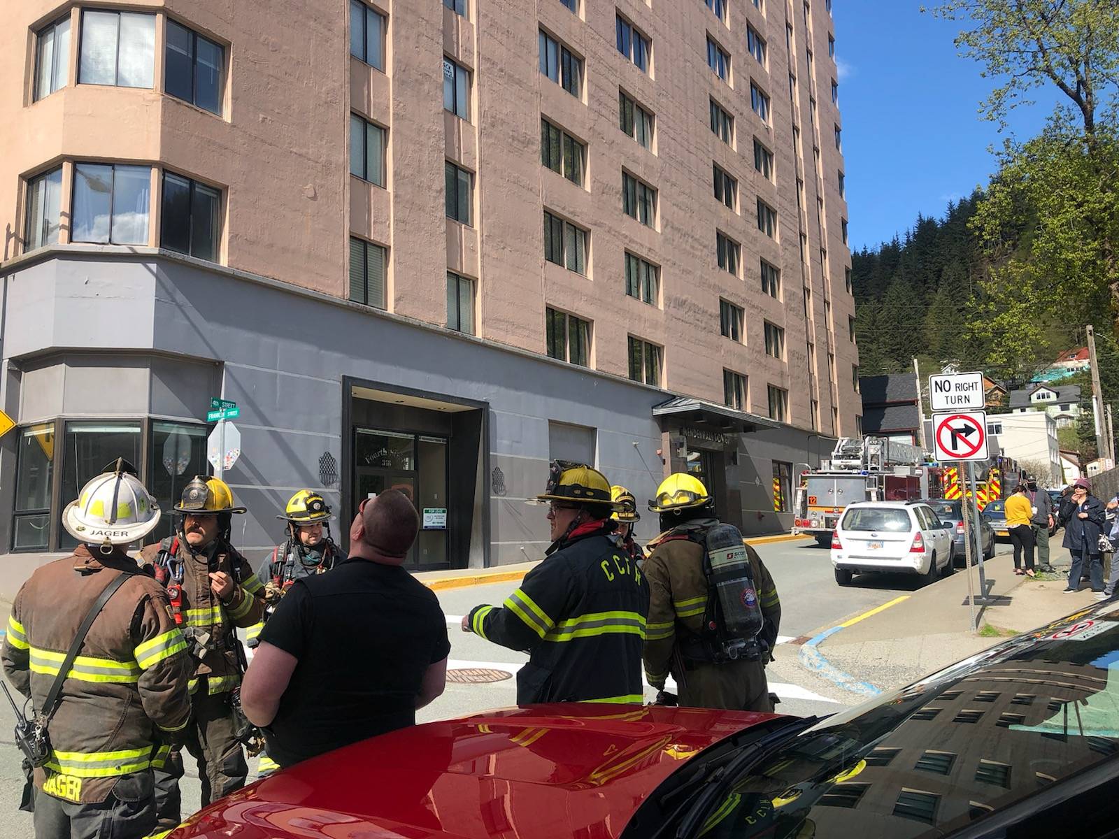 Residents of Mendenhall Towers were briefly evacuated Monday, May 17, while Capital City Fire/Rescue investigated smoke that had appeared, possibly from an electrical fire. (Peter Segall / Juneau Empire)