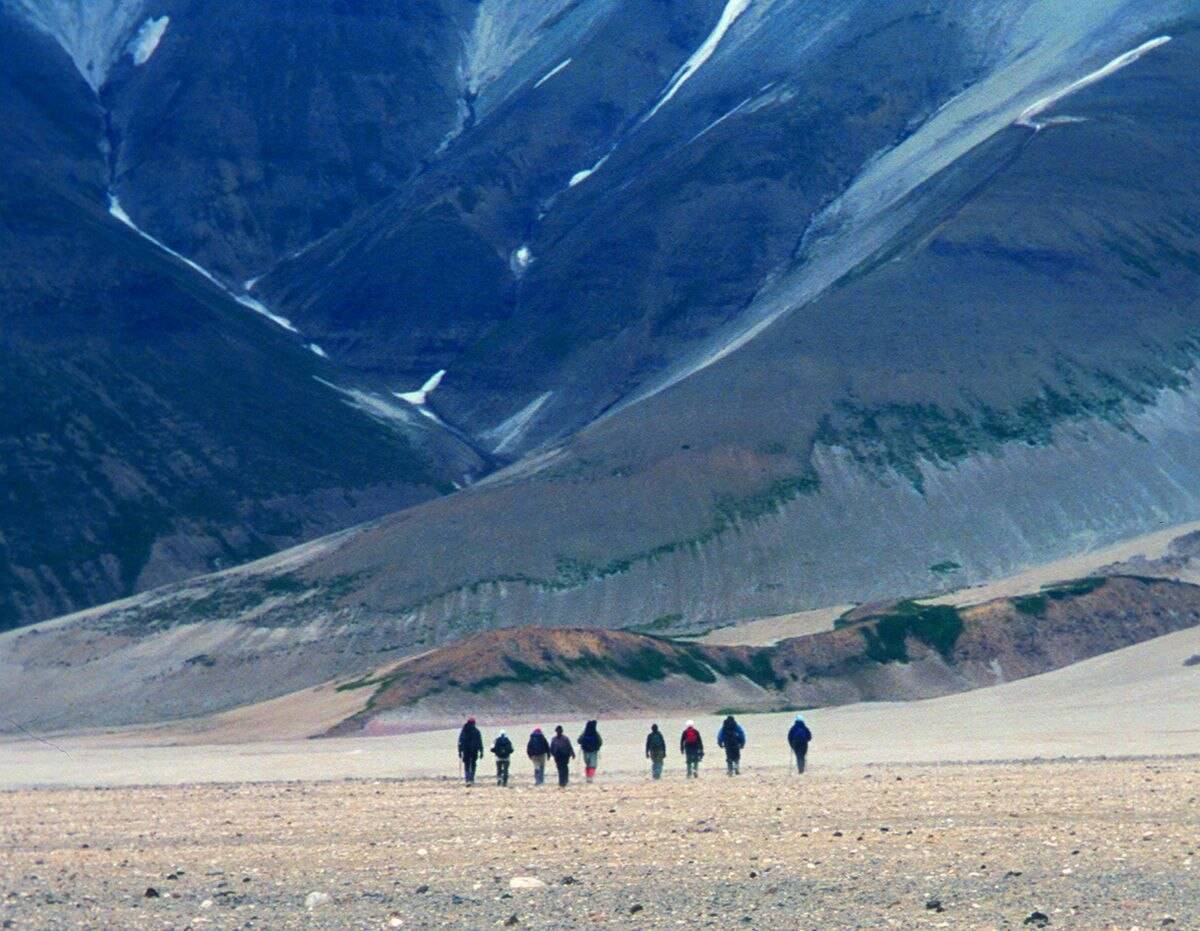 Courtesy Photo / Ned Rozell 
Hikers traverse the Valley of Ten Thousand Smokes on the Alaska Peninsula, walking on a sheet of ash and volcanic rock more than 500-feet thick.