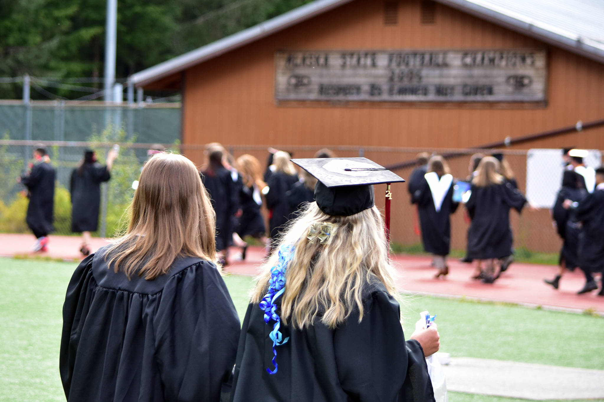 JDHS graduates make their way from a graduation ceremony held Sunday, May 23. All three Juneau public high school held ceremonies on Sunday. (Peter Segall / Juneau Empire)