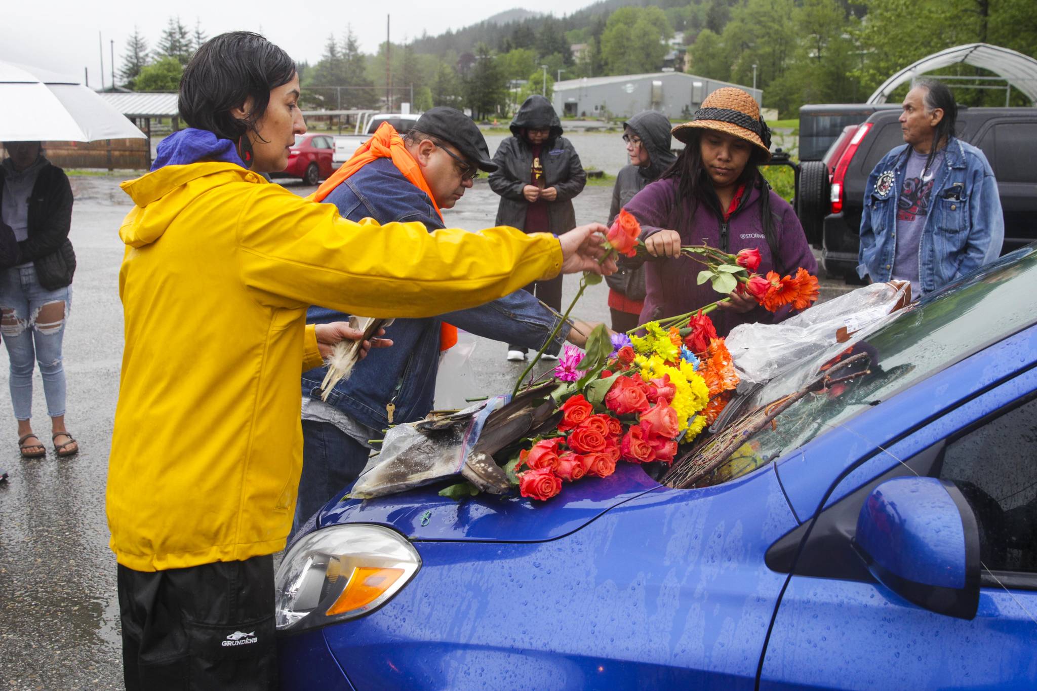 Michael S. Lockett / Juneau Empire
Juneau residents sing together outside the Juneau Montessori School, formerly the Mayflower School built by the Bureau of Indian Affairs, to honor the 215 dead Indigenous children found at a residential school in Canada, on May 31, 2021.