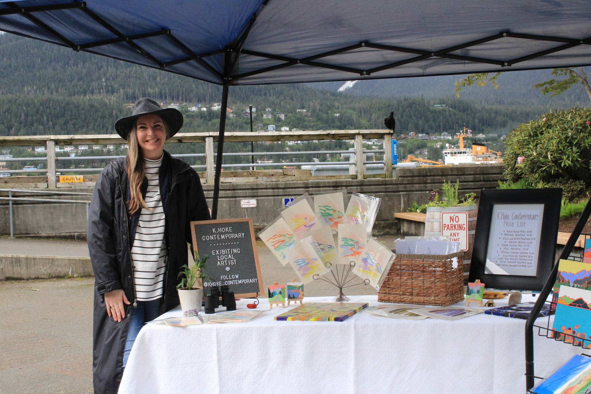 Vendors and shoppers met under misty skies on Saturday, June 5, at the Fresh Air Market, sponsored by the Juneau Arts and Humanities Council. The event marked one of the first community events of the summer season after COVID-19 forced the cancelation of many events in 2020. Vendor Kelsey Hoke Martin said that about 20 people had stopped by her booth in the first half-hour of business. (Dana Zigmund/Juneau Empire)