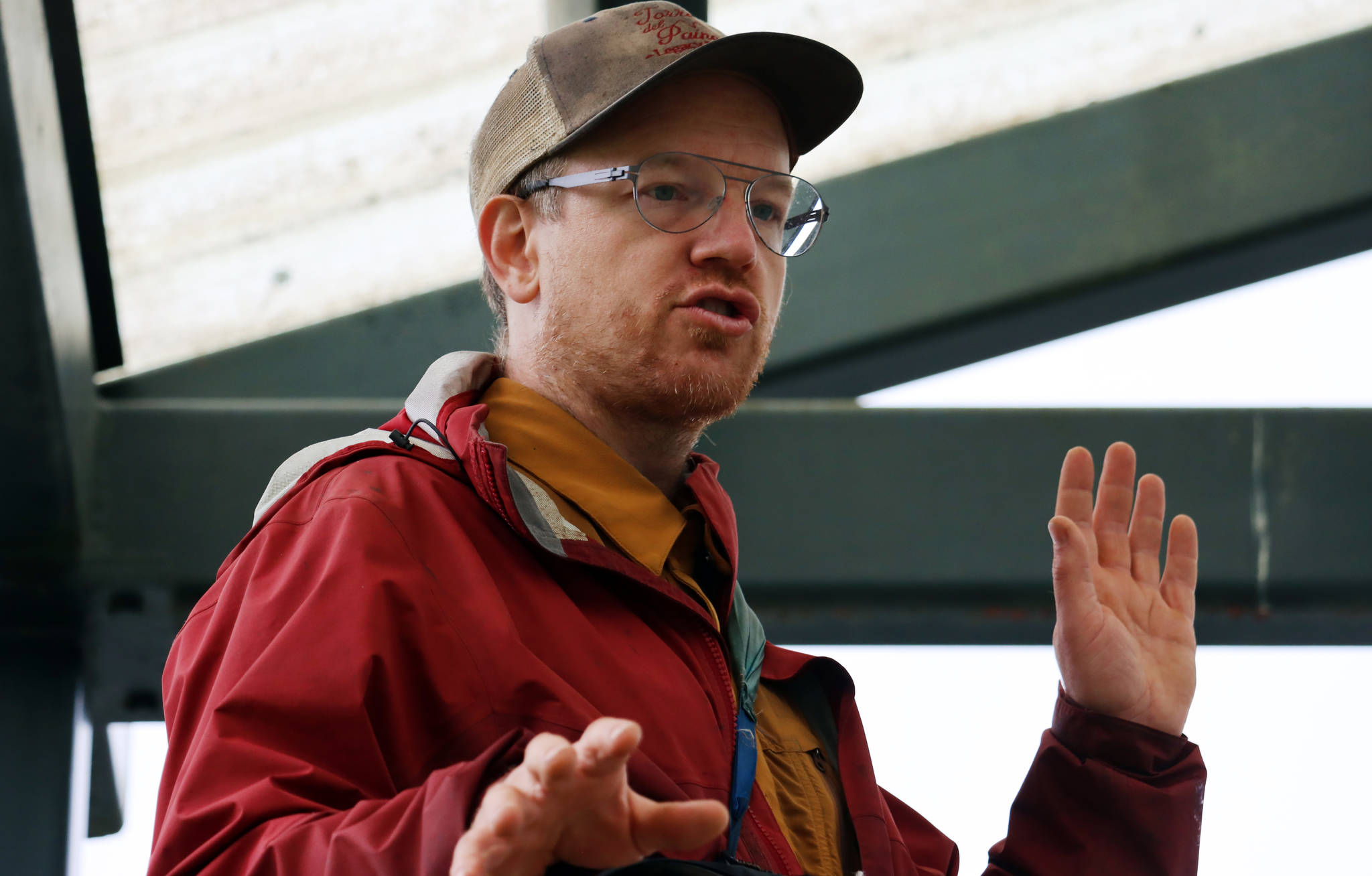 Bretwood “Hig” Higman, executive director of Ground Truth Trekking, talks Thursday at a news conference outside Dzantik’i Heeni Middle School about the risk of an eventual landslide in the Lemon Creek area. (Ben Hohenstatt / Juneau Empire)
