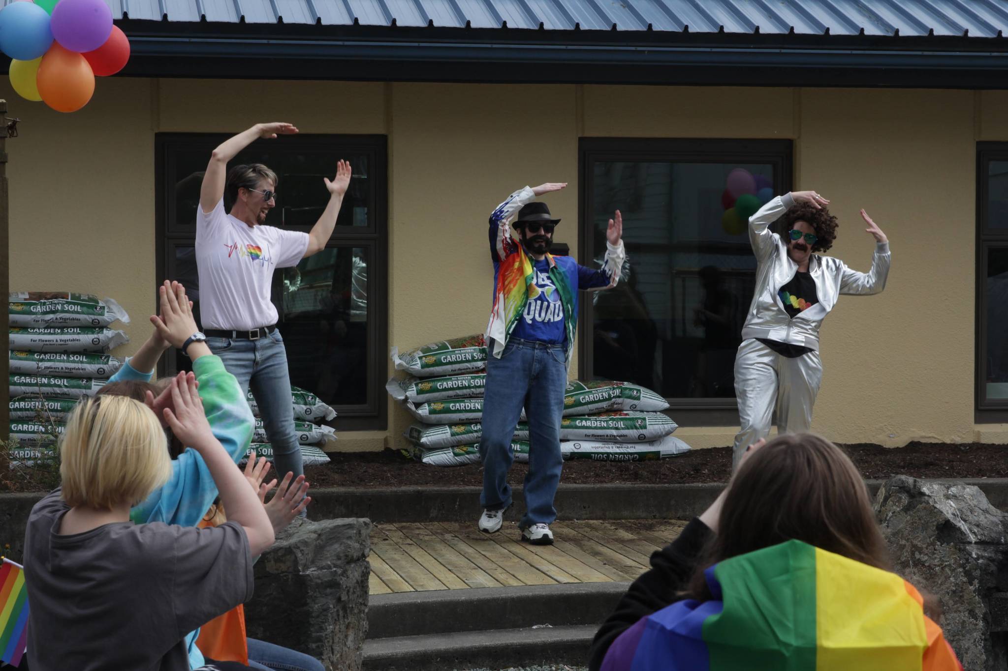 Drag performers dance to “YMCA” by the Village People at the Zach Gordon Youth Center’s Pride Month event at the center on Saturday, June 12, 2021. (Michael S. Lockett / Juneau Empire)