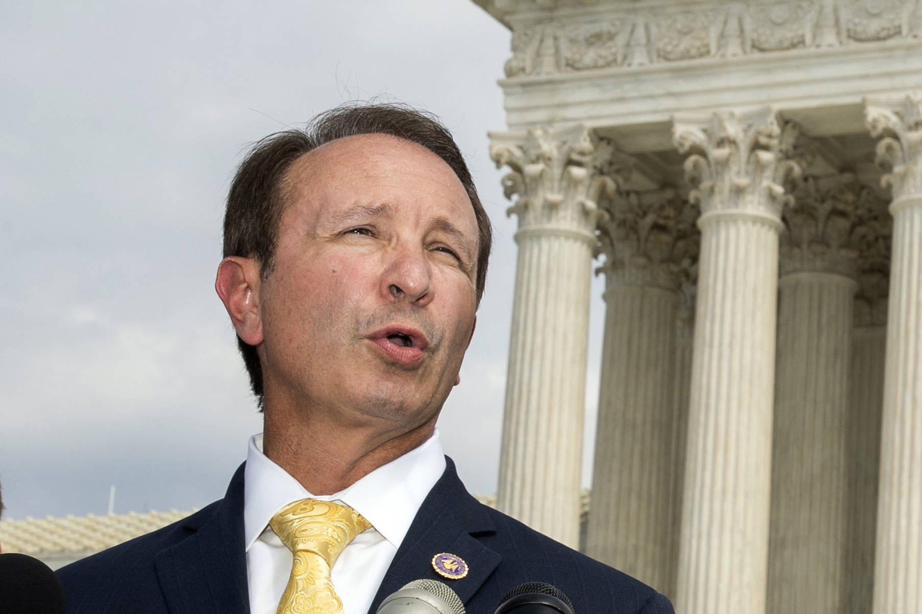 Louisiana Attorney General Jeff Landry speaks in front of the U.S. Supreme Court in Washington. The Biden administration’s suspension of new oil and gas leases on federal land and water was blocked Tuesday, June 15, 2021, by a federal judge in Louisiana. U.S. District Judge Terry Doughty’s ruling came in a lawsuit filed in March by Louisiana’s Republican attorney general, Jeff Landry and officials in 12 other states. Doughty’s ruling granting a preliminary injunction to those states said his order applies nationwide. (AP Photo / Manuel Balce Ceneta, File)