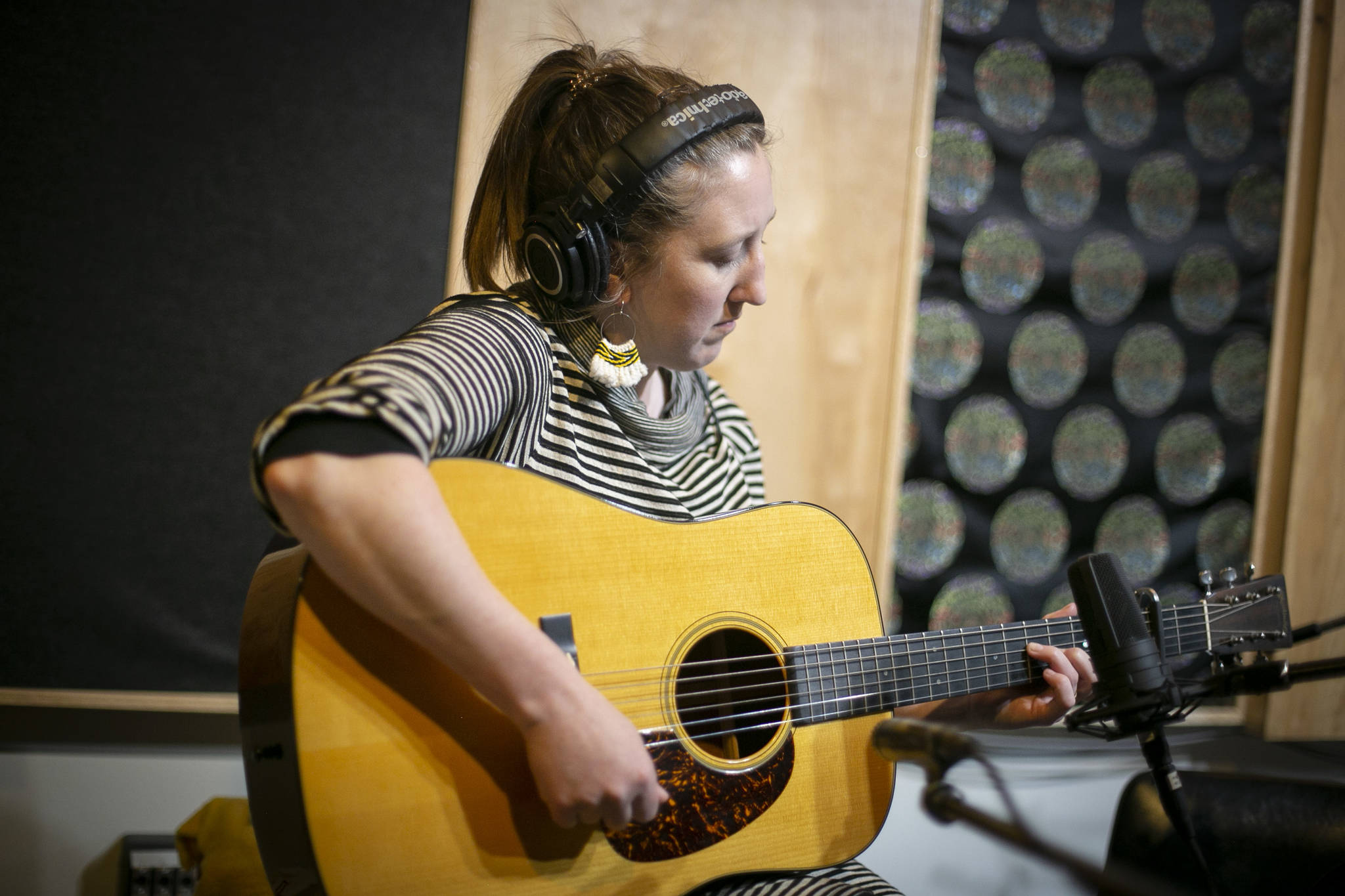 Courtesy Photo / Annie Bartholomew 
Erin Heist plays guitar during the recording of her forthcoming single and EP, which share a title, “Another Rainy Day.”