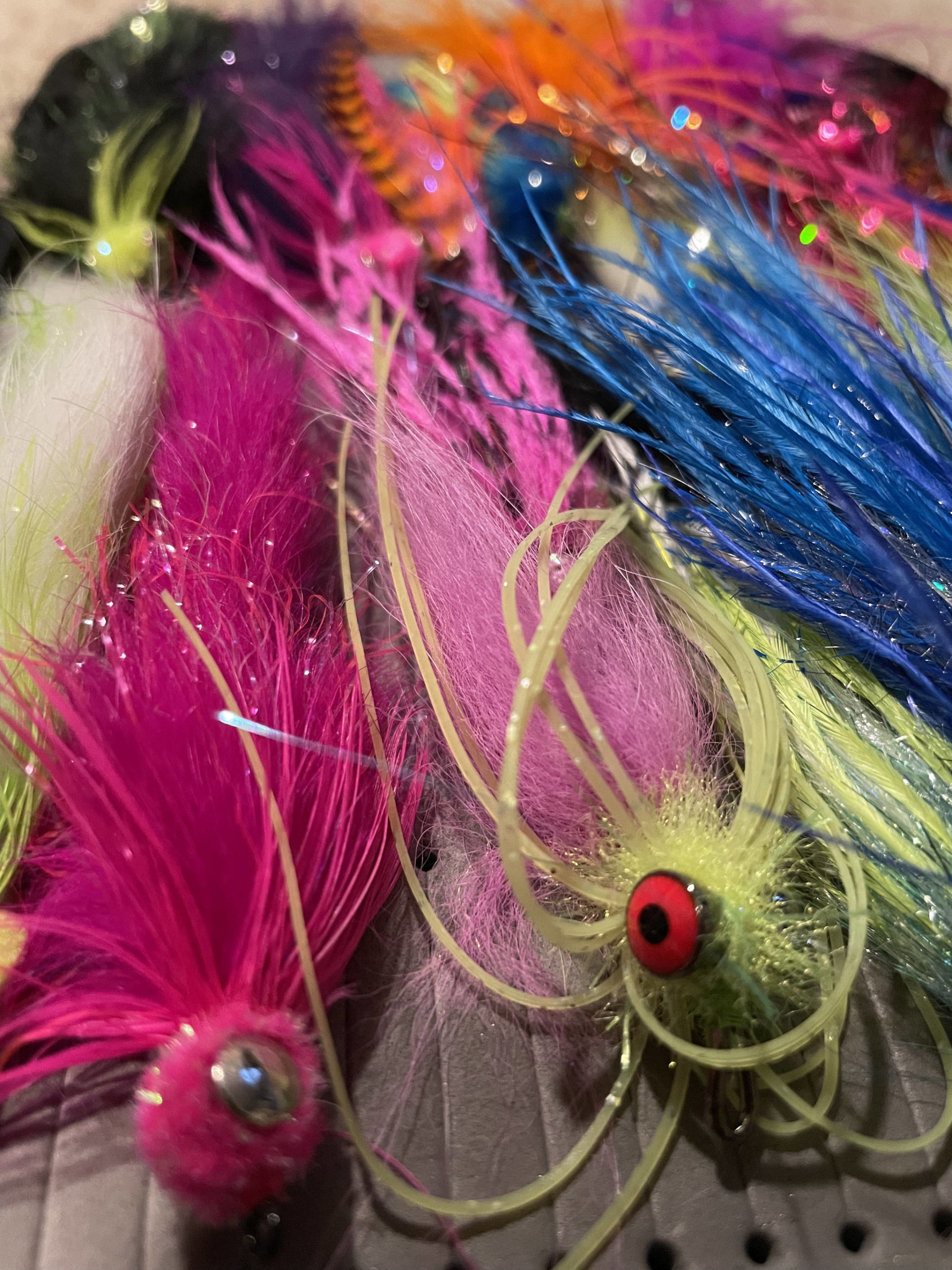 I have flies with barbell eyes, jig heads, cone heads, bead heads and no heads. I have flies with stinger hooks that trail and long-shanked salmon hooks that don’t. I have red, pink, salmon, fuchsia, cerise, purple, orange, flesh, green, olive, chartreuse, white and black flies made of feathers, chenille, hackle, marabou, flashabou and silicone. (Jeff Lund / For the Juneau Empire)
