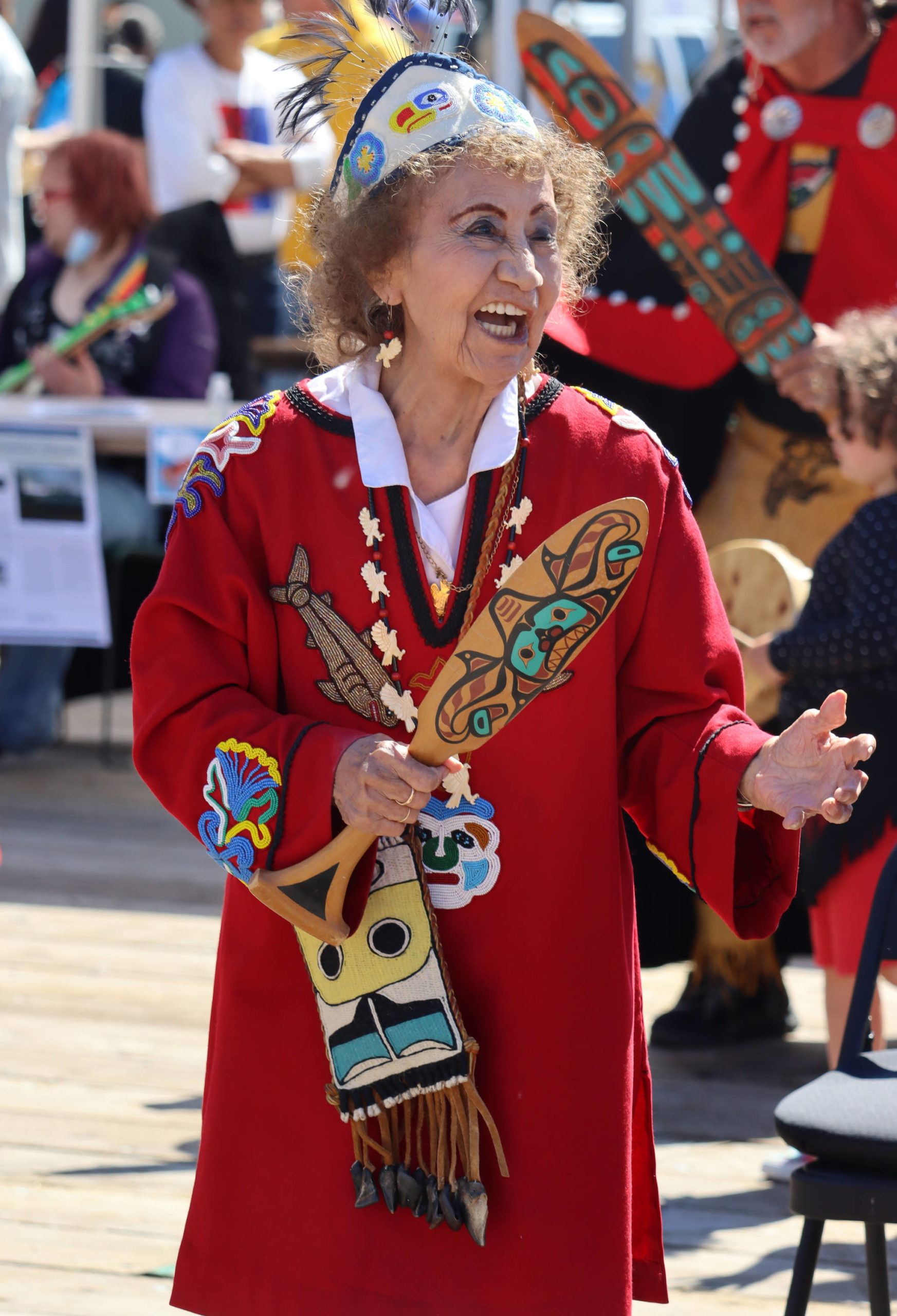 Cece Unick stands to dance during the multicultural Yèes Ku.oo Dancers’ performance of “Wooshkeetaan Love Song” during the 11th edition of the Juneau Maritime Festival. (Ben Hohenstatt / Juneau Empire)