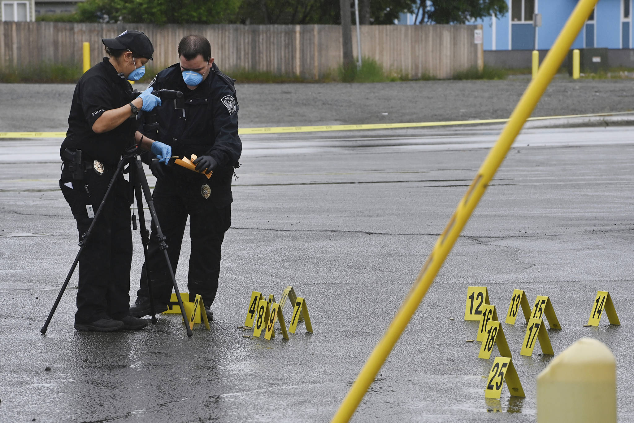 Police investigate the scene of an early morning fatal shooting along Gambell Street between Fourth Avenue and Fifth Avenue near downtown Anchorage, Alaska, Saturday, June 19, 2021. (Bill Roth / Anchorage Daily News)