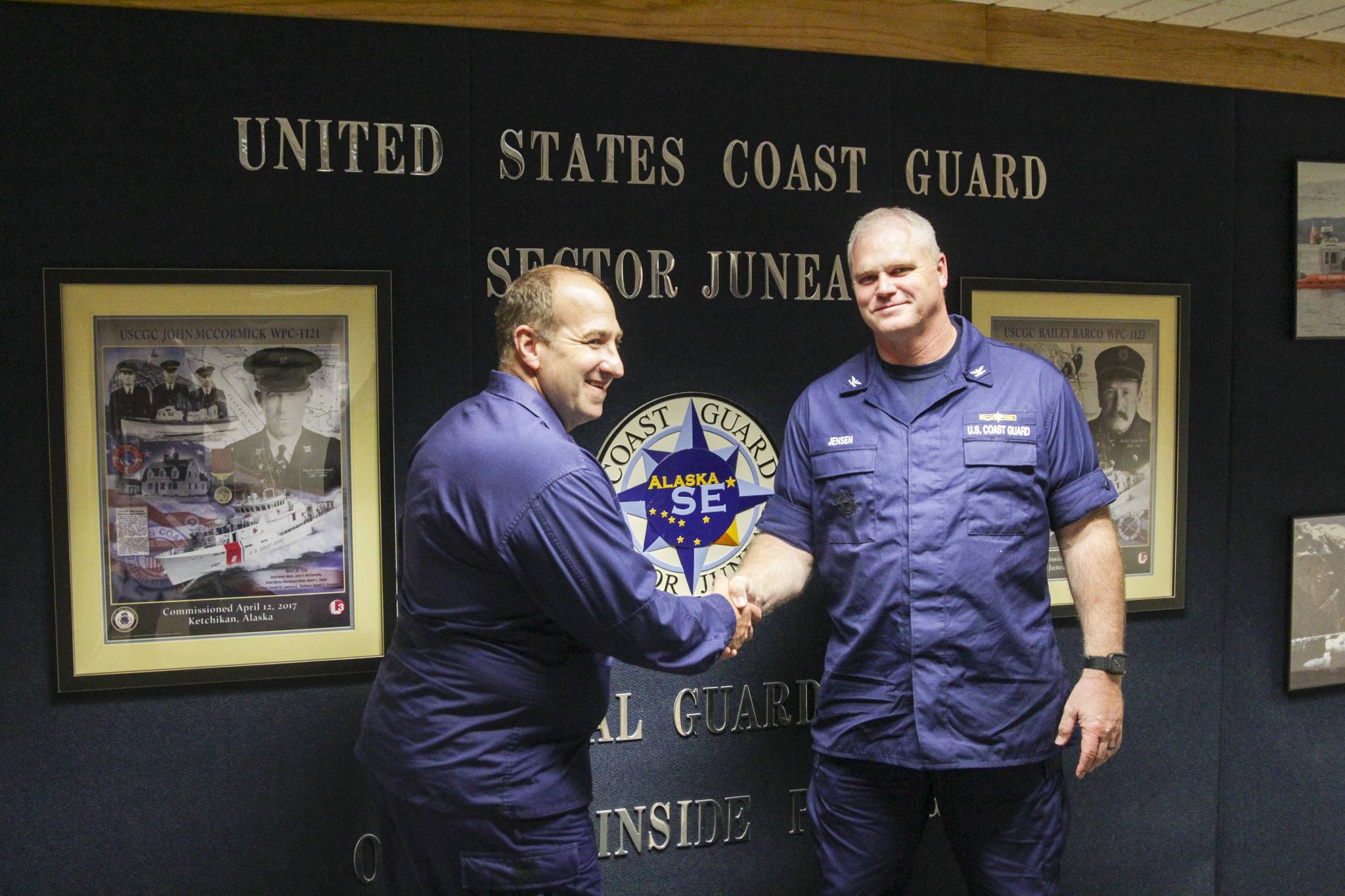 Capt. Darwin A. Jensen, right, will take command of Sector Juneau from Capt. Stephen R. White, left, on July 7, 2021. (Michael S. Lockett / Juneau Empire)