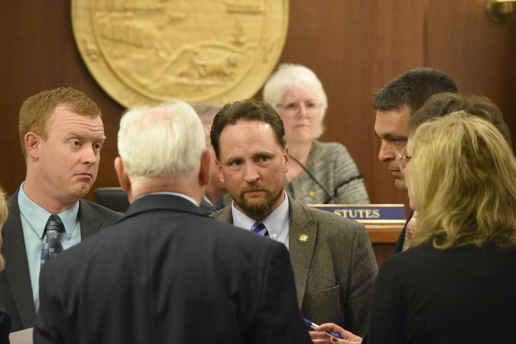 Members of the House Republican Minority Caucus talk amongst themselves during an at ease on the floor of the Alaska House of Representatives on Monday, June 28, 2021. House members reached a deal on an operating budget and avoided a government shutdown but members of the minority said they had been repeatedly pushed out of the process. (Peter Segall / Juneau Empire)
