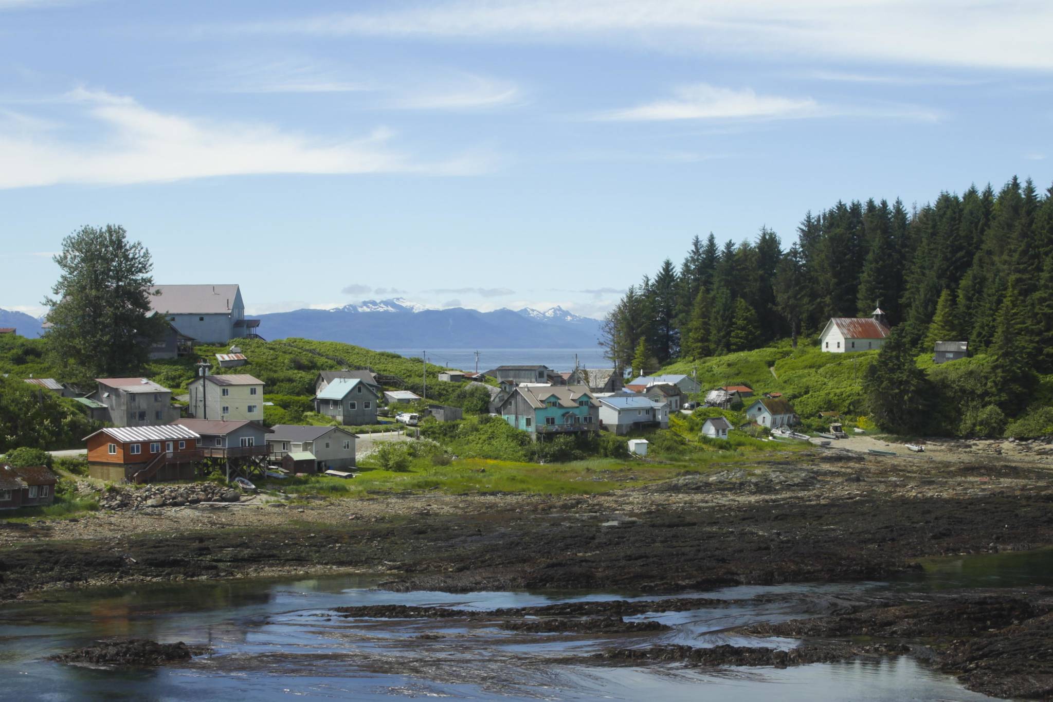 Angoon, seen in this Tuesday photo, is one of the nearly 200 communities across Alaska that are served by the Power Cost Equalization program, which reduces power coasts for rural customers. PCE is poised to be unfunded due to a bookkeeping mechanism known as the sweep. Legislative leaders have said they intend to vote on the reverse sweep, which would fund the PCE among other programs, during a special session in August. (Michael S. Lockett / Juneau Empire)
