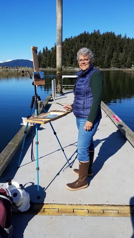 This undated photo shows local artist Christine Lewis painting en plein air. Lewis’ work will be featured at Juneau Artists Gallery for First Friday. (Courtesy Photo / Christine Lewis)