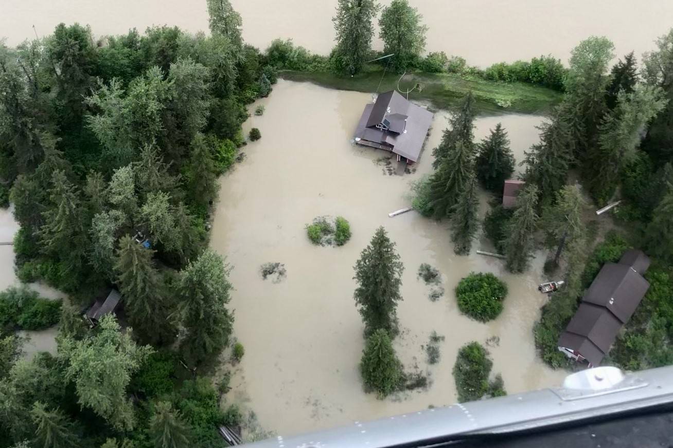A July 1, 2021 photo shows property damaged by record-high flooding on the Taku River after warm weather caused a build-up of ice melt. (Courtesy photo / Kathleen Samalon)
