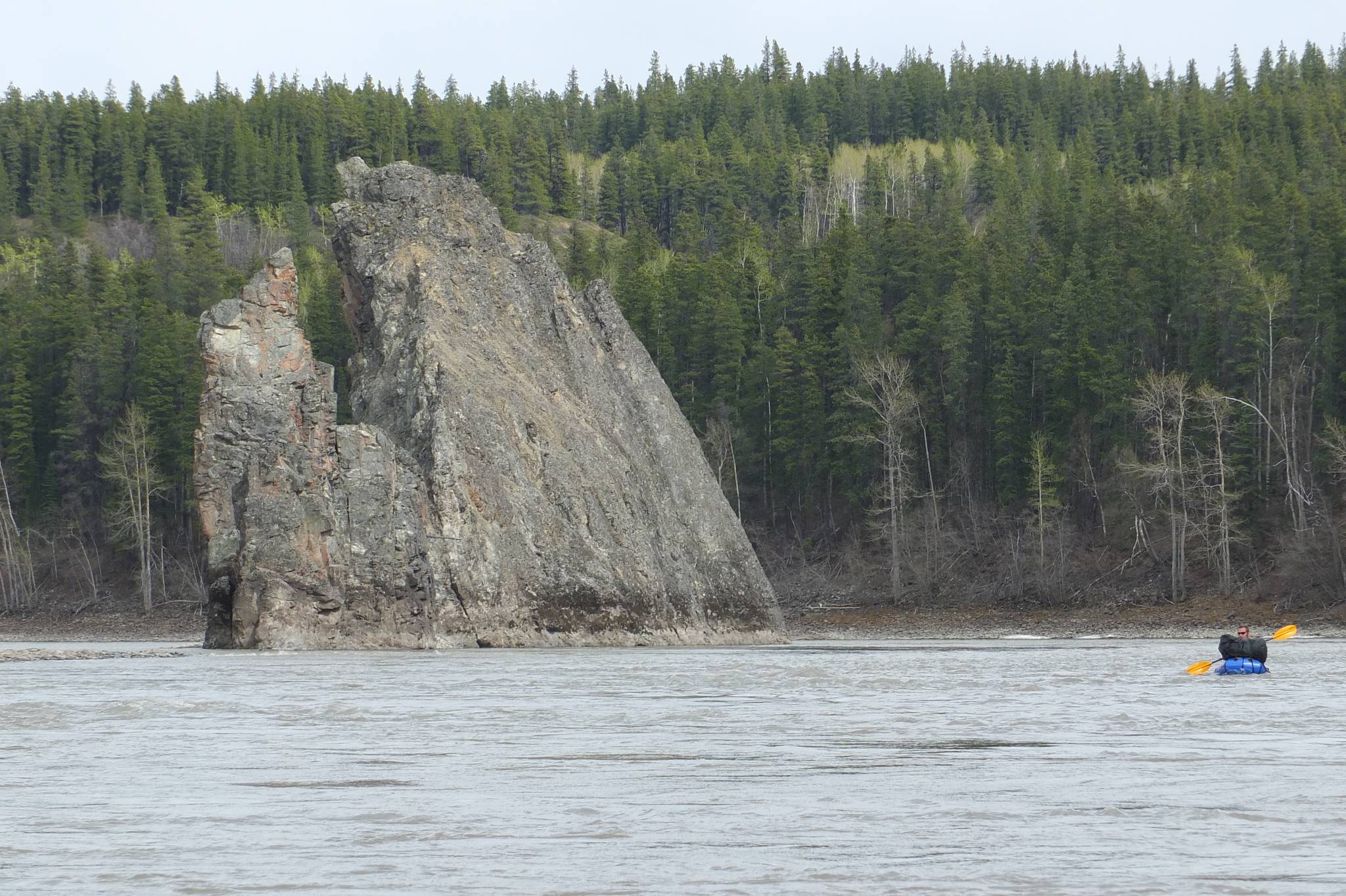 Bjorn Dihle paddles past one of the rock formations known as the “three sisters” just a few miles downstream from Telegraph Creek. (Courtesy Photo / Mary Catharine Martin)