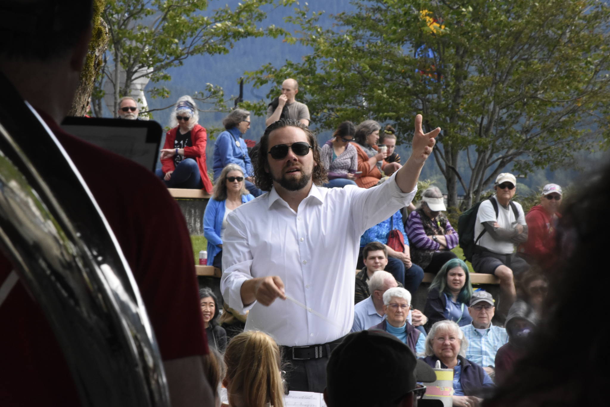 Tristan Hovest, originally from Juneau but now living in Fairbanks, serves as guest conductor for the Juneau Volunteer Marching Band on Saturday. (Peter Segall / Juneau Empire)