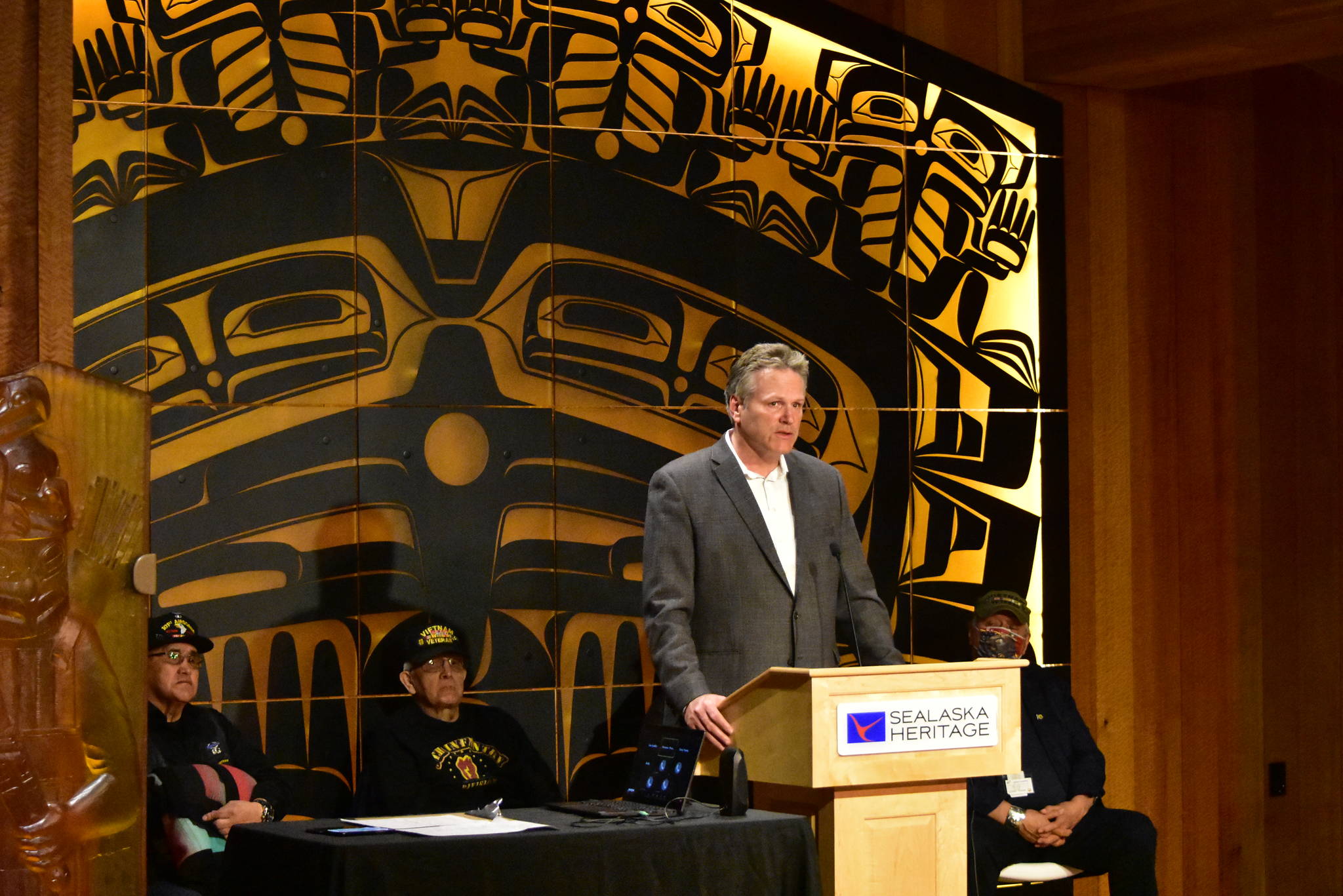 Gov. Mike Dunleavy speaks at a ceremony for Alaska Native Veterans from the Vietnam era at the Walter Soboleff Building in downtown Juneau on May 5, 2021. Dunleavy announced the state filed a lawsuit Wednesday against the Biden administration for what Dunleavy says is illegally keeping restrictions in place on federal lands in Alaska. (Peter Segall / Juneau Empire)