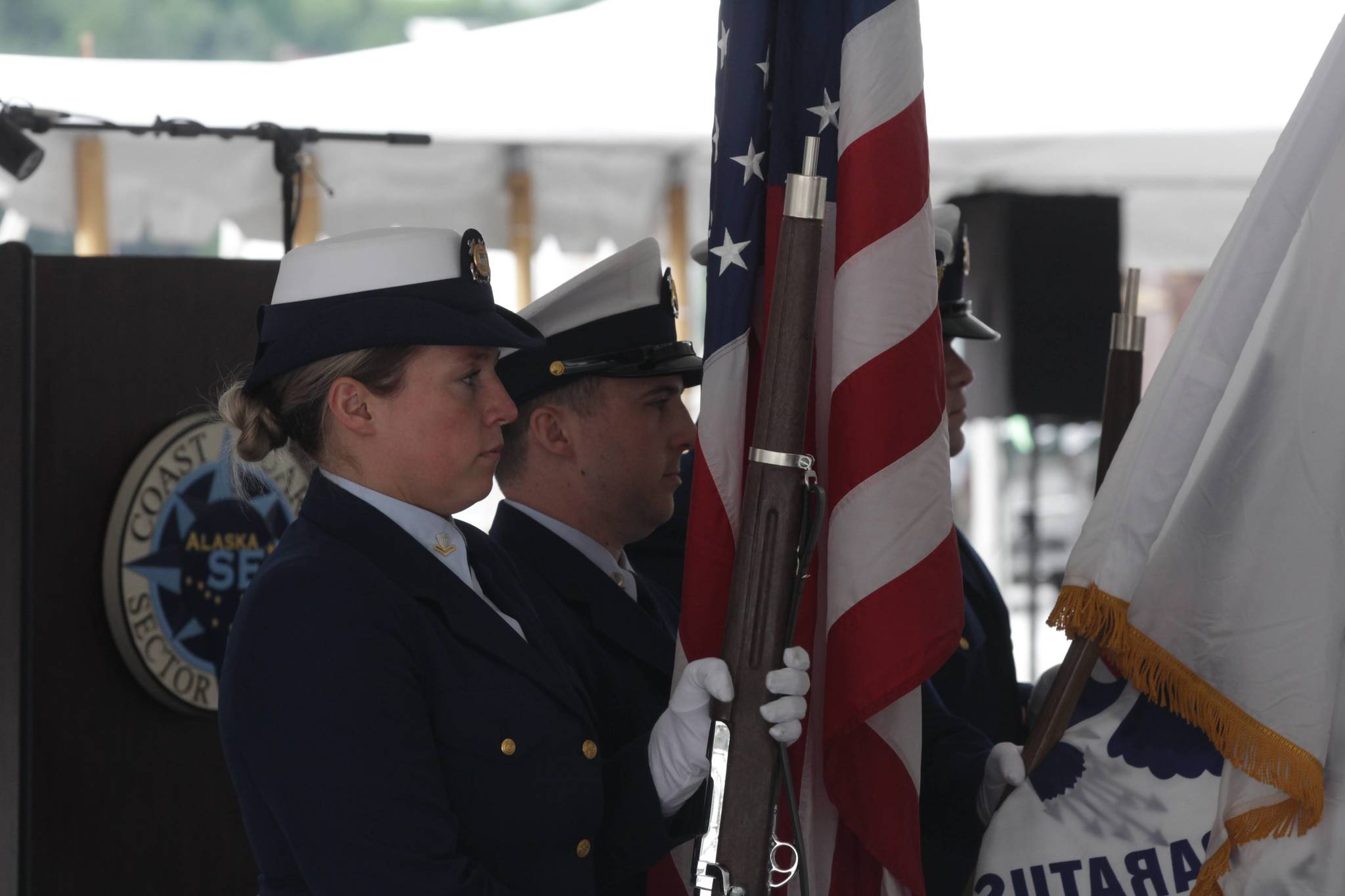 Coast Guardsmen parade the colors during a change of command ceremony at Station Juneau on July 7, 2021. (Michael S. Lockett / Juneau Empire)