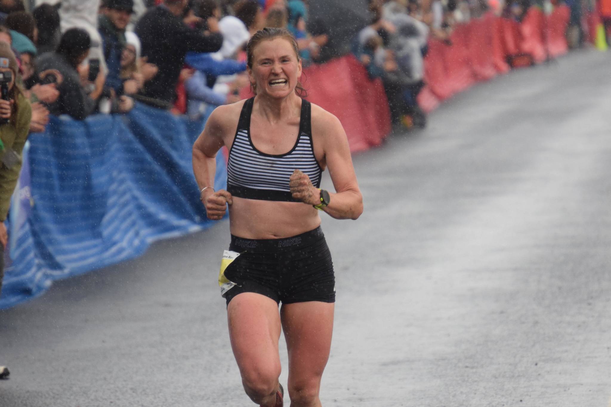 Hannah Lafleur, 32, of Seward defends her title in the women's Mount Marathon Race in Seward, Alaska, on Wednesday, July 7, 2021. (Photo by Jeff Helminiak/Peninsula Clarion)