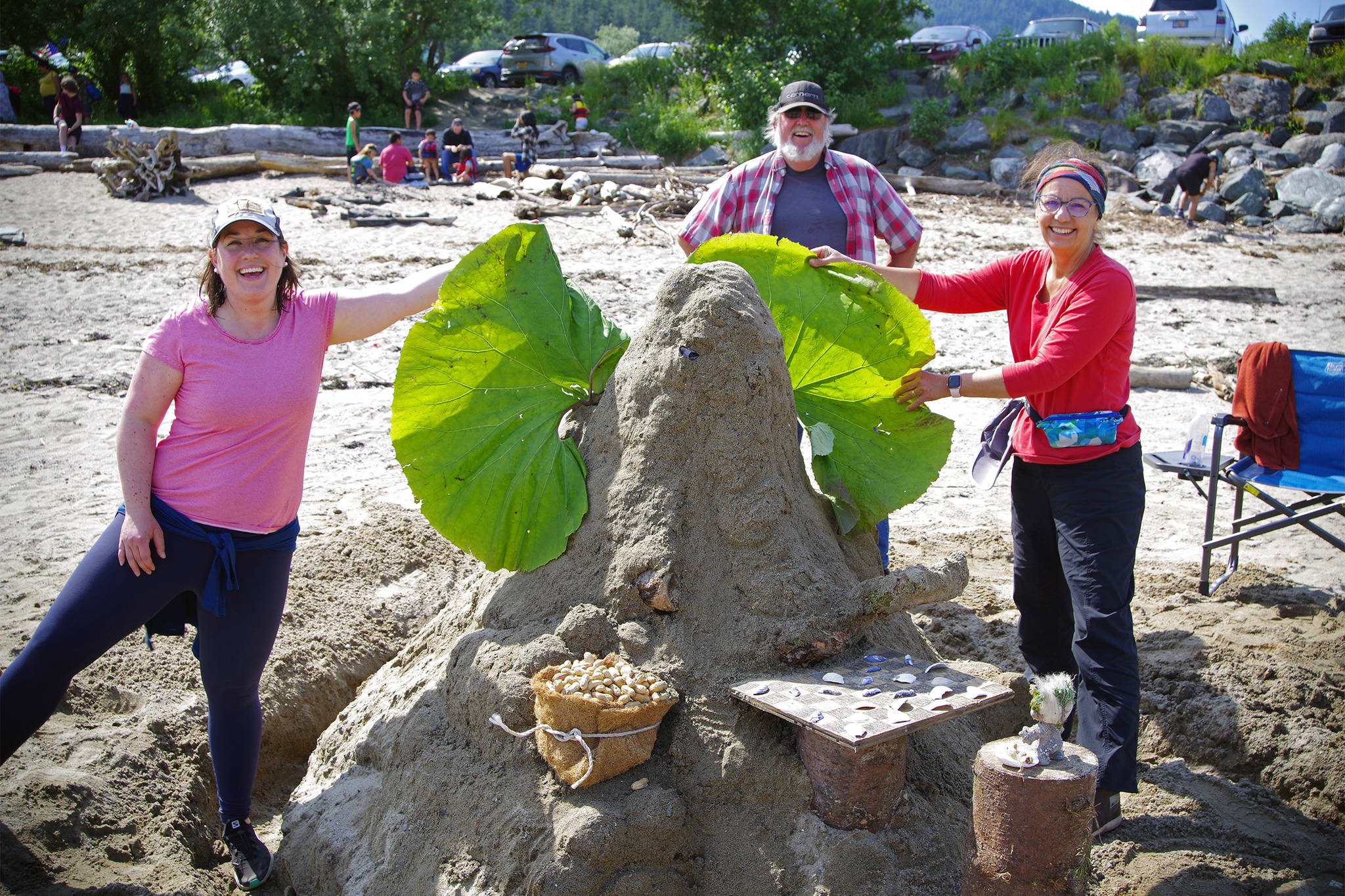 Team Waldon Trolls shows off their sandcastle, “Elephant Playing Checkers with a Troll,” which was awarded first place in the sandcastle competition sponsored by the Douglas Fourth of July committee on July 4, 2021. (Courtesy photo/Zane Jones)