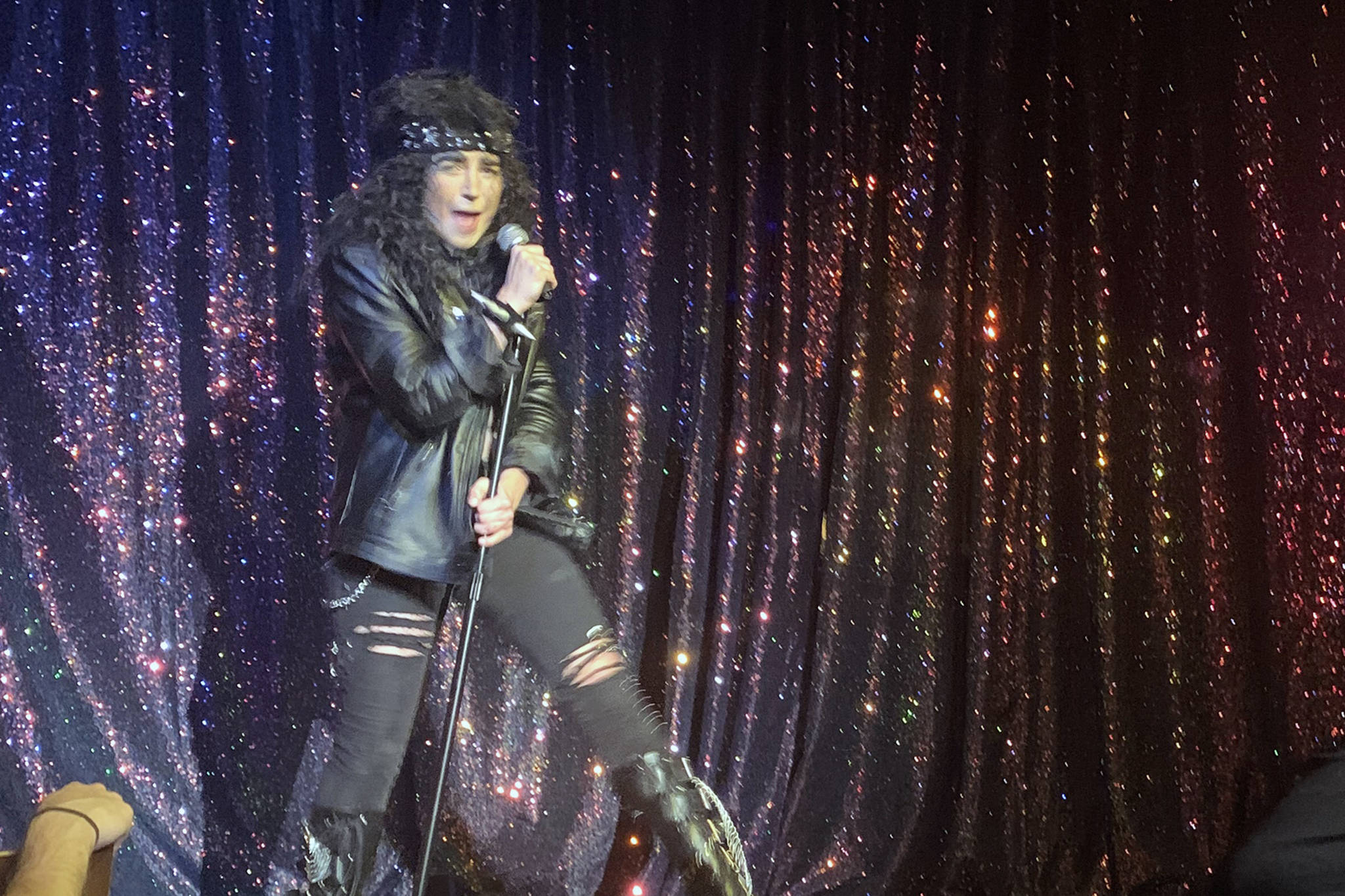 Brita Fagerstrom performs as Roman Wilde at the Alaskan Hotel and Bar on July 8. During the show, Fagerstrom performed show-stopping numbers as Wilde, including an homage to Queen, a roof-raising Bon Jovi tribute, and a fun turn as a retro crooner. (Dana Zigmund/Juneau Empire)