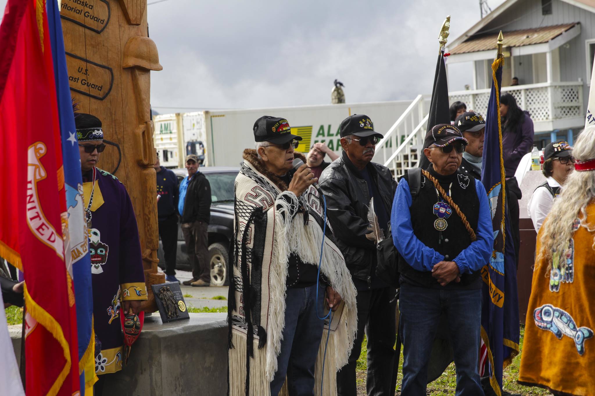 George Bennett Sr., a Vietnam War veteran, speaks during a ceremony for the raising of a totem pole honoring veterans of the armed services in Hoonah on July 24, 2021. (Michael S. Lockett / Juneau Empire)