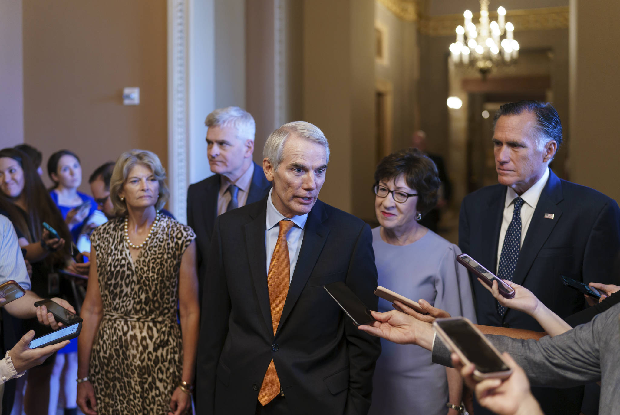 AP Photo/J. Scott Applewhite 
Sen. Rob Portman, R-Ohio, center, joined by, from left, Sen. Lisa Murkowski, R-Alaska, Sen. Bill Cassidy, R-La., Sen. Susan Collins, R-Maine, and Sen. Mitt Romney, R-Utah, announces to reporters that he and the other GOP negotiators have reached agreement on a $1 trillion infrastructure bill with Democrats and are ready to vote to take up the bill, at the Capitol in Washington, Wednesday, July 28, 2021.