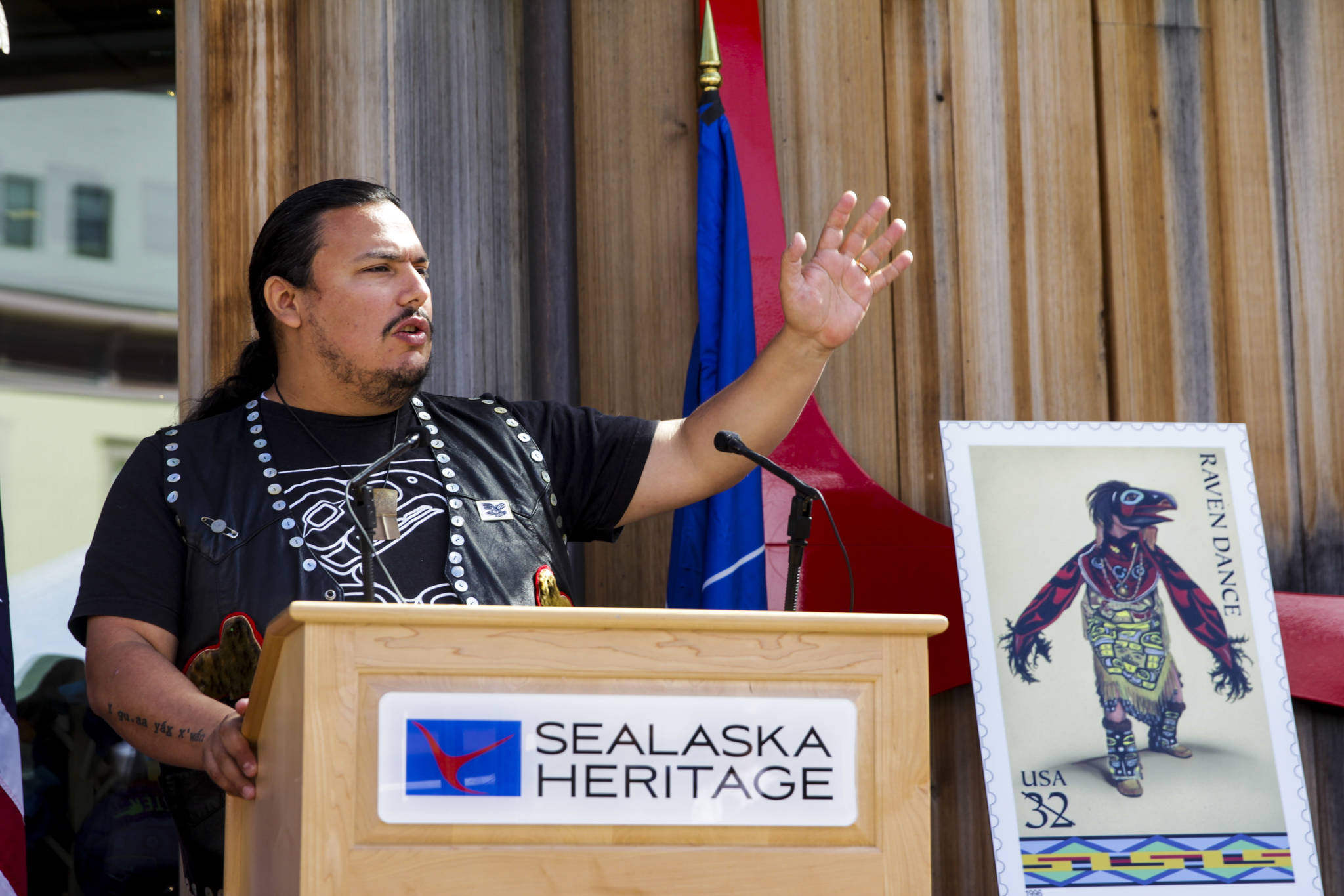 Michael S. Lockett / Juneau Empire 
Frank Henry Kaash Katasse regales guests at the official release of the Raven Story stamp with a retelling of the traditional story in front of the Sealaska Heritage Institute’s Walter Soboleff Building on Friday, July 30, 2021.