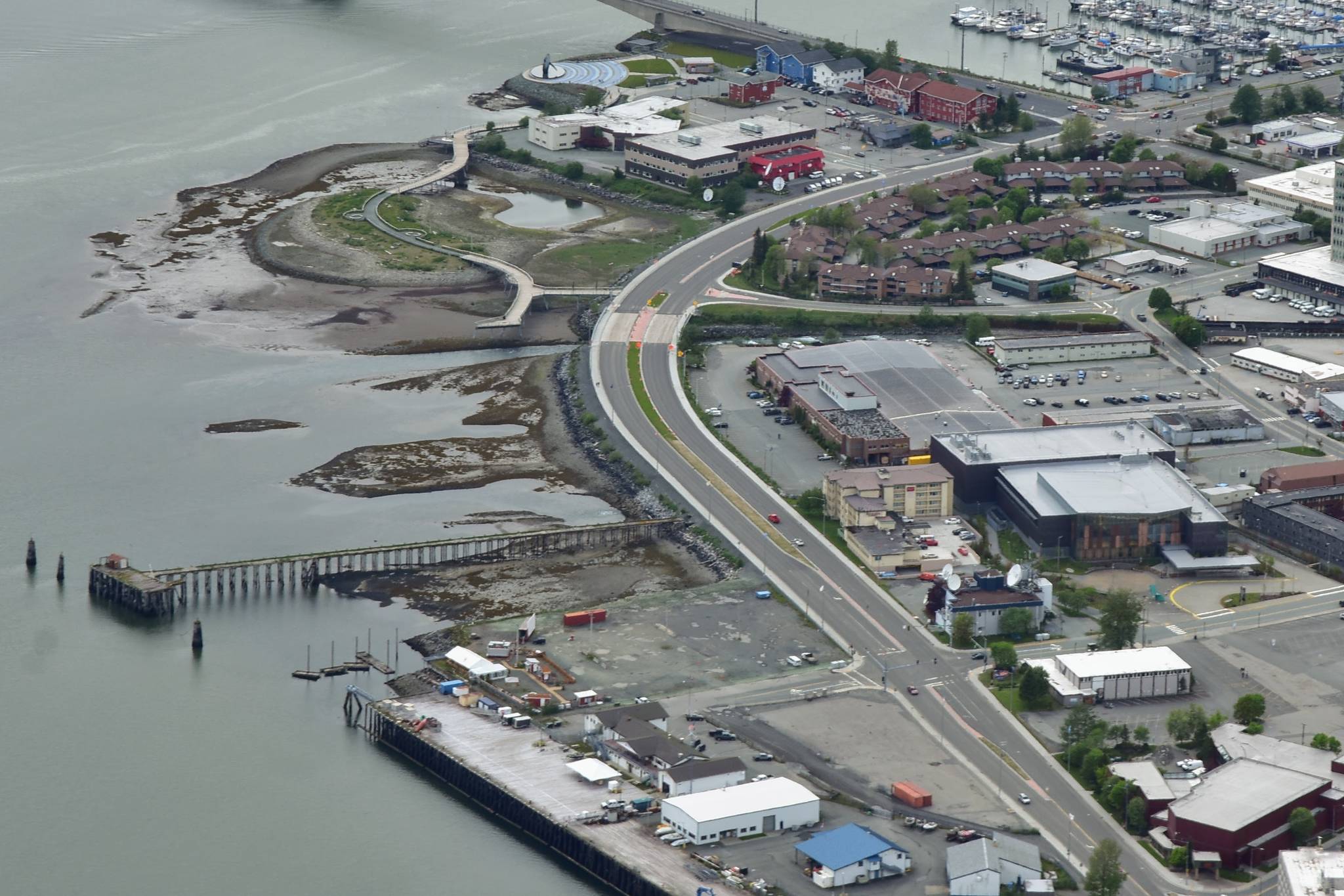 The City and Borough of Juneau Assembly gave the city manager's office the go-ahead to begin negotiations with Norwegian Cruise Line over land the company needs to build its proposed dock on Egan Drive, seen here on Jun. 6, 2021. The company will need access to state and city-owned tidelands in order to complete the dock, and City Manager Rorie Watt told Assembly members Monday the company could now submit its applications. (Peter Segall / Juneau Empire)