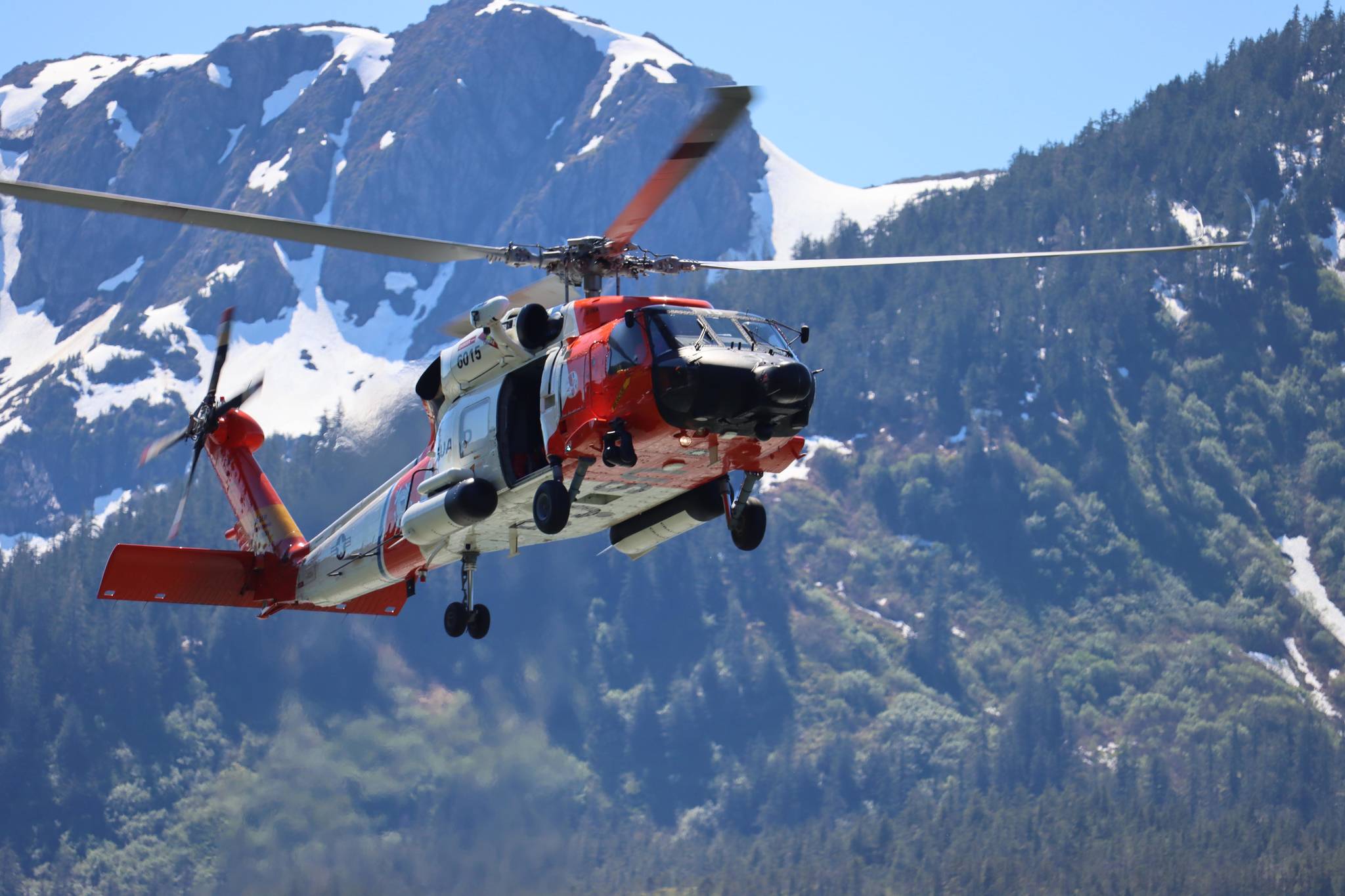 A Coast Guard aircrew aboard an MH-60 Jayhawk helicopter like the one in this June 19 photo, rescued two plane crash survivors 40 miles southeast of Ketchikan on Saturday, Aug. 7, 2021. (Ben Hohenstatt / Juneau Empire File)
