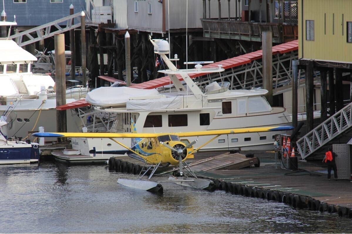 This Aug. 5, 2021, photo provided by Lee LaFollette shows a de Havilland Beaver aircraft departing the Port of Ketchikan, Alaska. Foggy, reduced-visibility conditions have delayed efforts to recover the wreckage of a sightseeing plane that crashed in southeast Alaska, killing six people. Clint Johnson, chief of the National Transportation Safety Board’s Alaska region, says the agency had hoped to recover the wreckage Sunday. But he says those efforts were called off due to poor conditions. He says the crew planned to try again on Monday, Aug. 9, 2021. (Lee LaFollette via AP)
